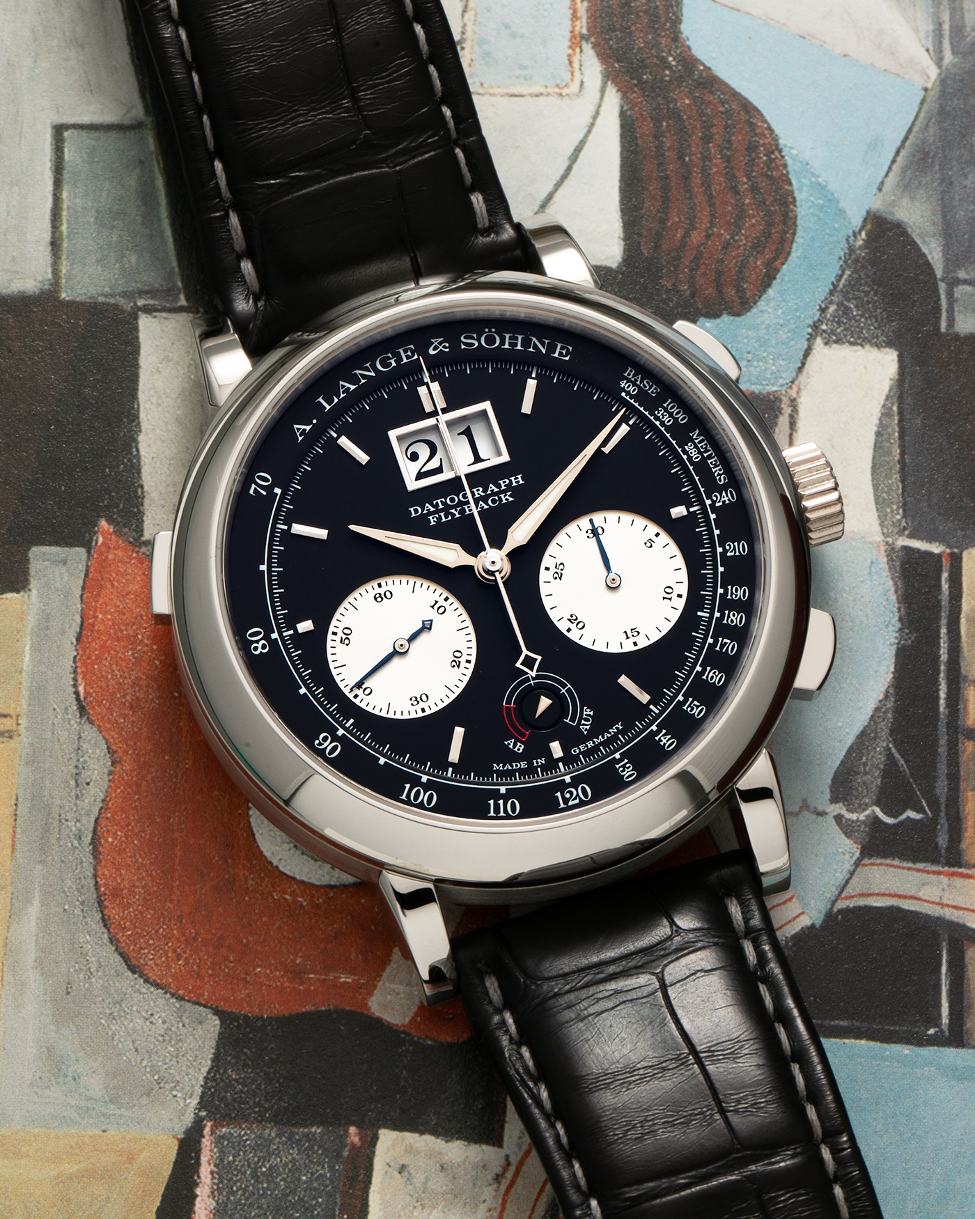 Brand: A. Lange & Söhne Year: 2020 Model: Datograph Up/Down Reference Number: 405.035 Material: Platinum 950 Movement: A. Lange & Söhne Cal. L951.6, Manual-Winding Case Dimensions: 41mm x 13.1mm Lug Width: 20mm Strap: A. Lange & Söhne Black Alligator Strap with Signed Platinum 950 Tang Buckle