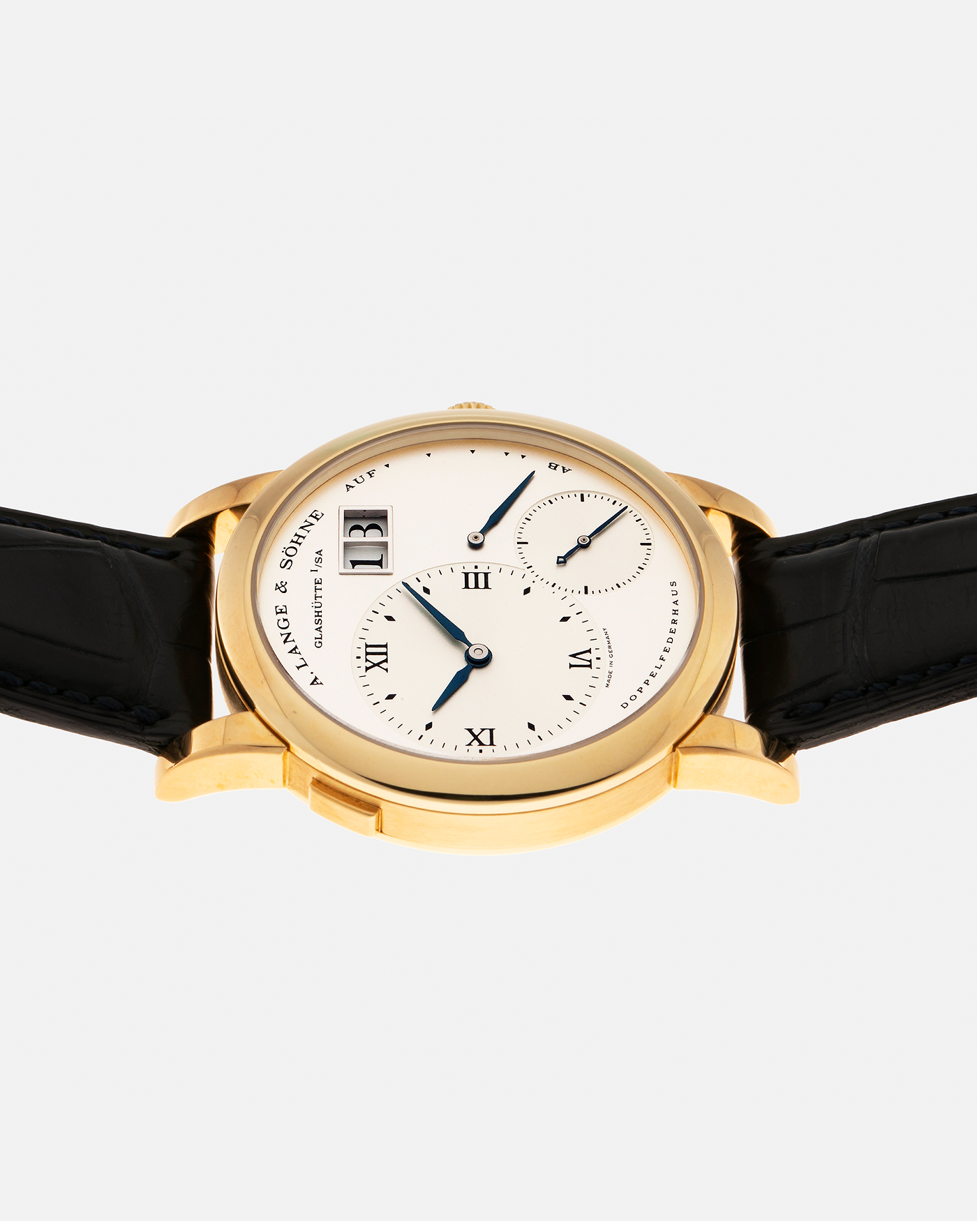 Brand: A. Lange & Söhne Year: 2000s Model: Lange 1 Reference: 101.022 Material: 18-carat Yellow Gold, German Silver Movement: A. Lange & Söhne Cal. L901.0, Manual-Winding Case Diameter: 38.5mm Lug Width: 20mm Strap: A. Lange & Söhne Black Alligator Leather Strap with Signed 18-carat Yellow Gold Tang Buckle