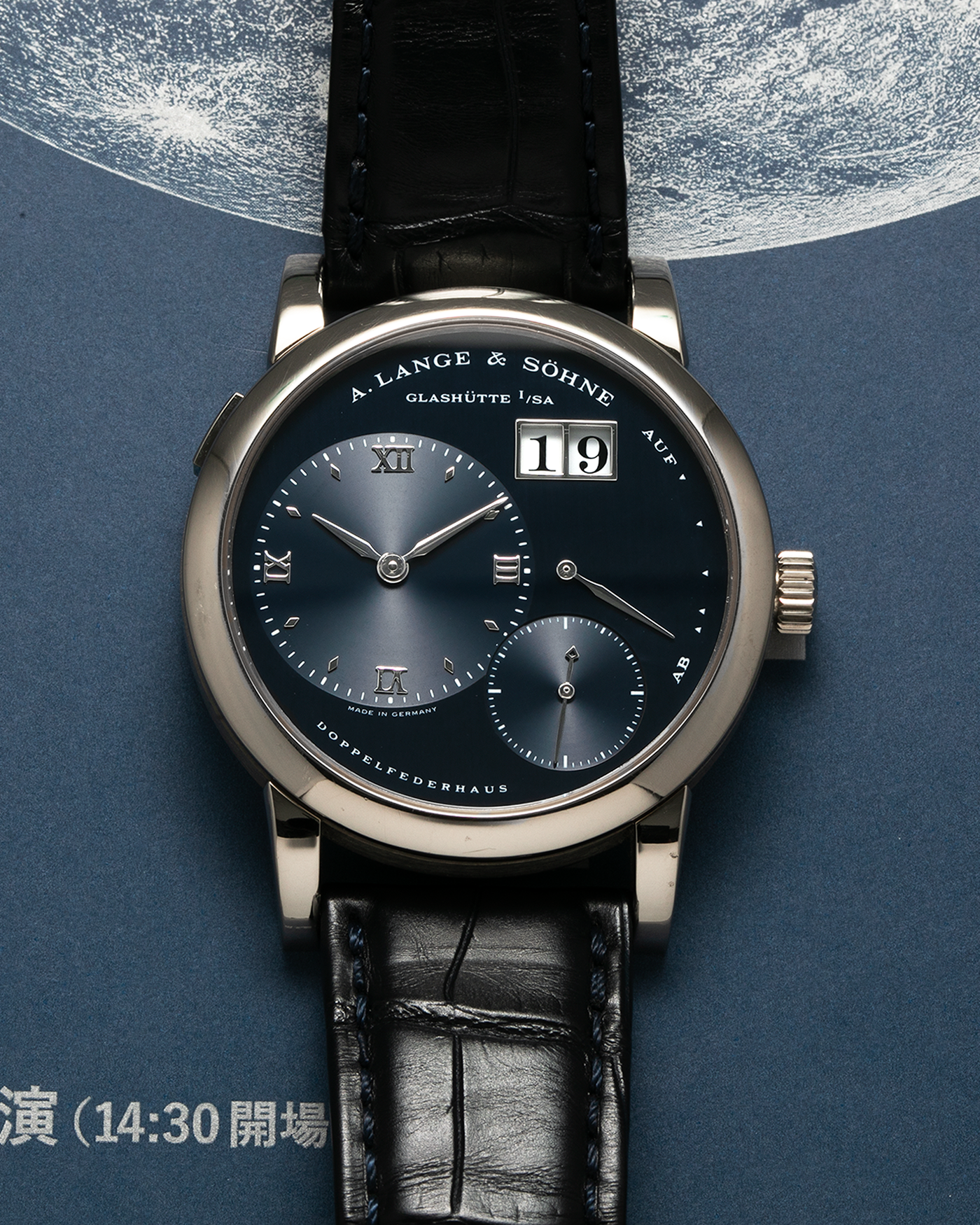 Brand: A. Lange & Söhne Year: 2000’s Model: Lange 1 Reference Number: 101.027 Material: 18-carat White Gold Movement: A. Lange & Söhne Cal. L901.5, Manual Winding Case Diameter: 38.5mm Strap: A. Lange & Söhne Black Alligator Leather Strap with Signed 18-carat White Gold Tang Buckle