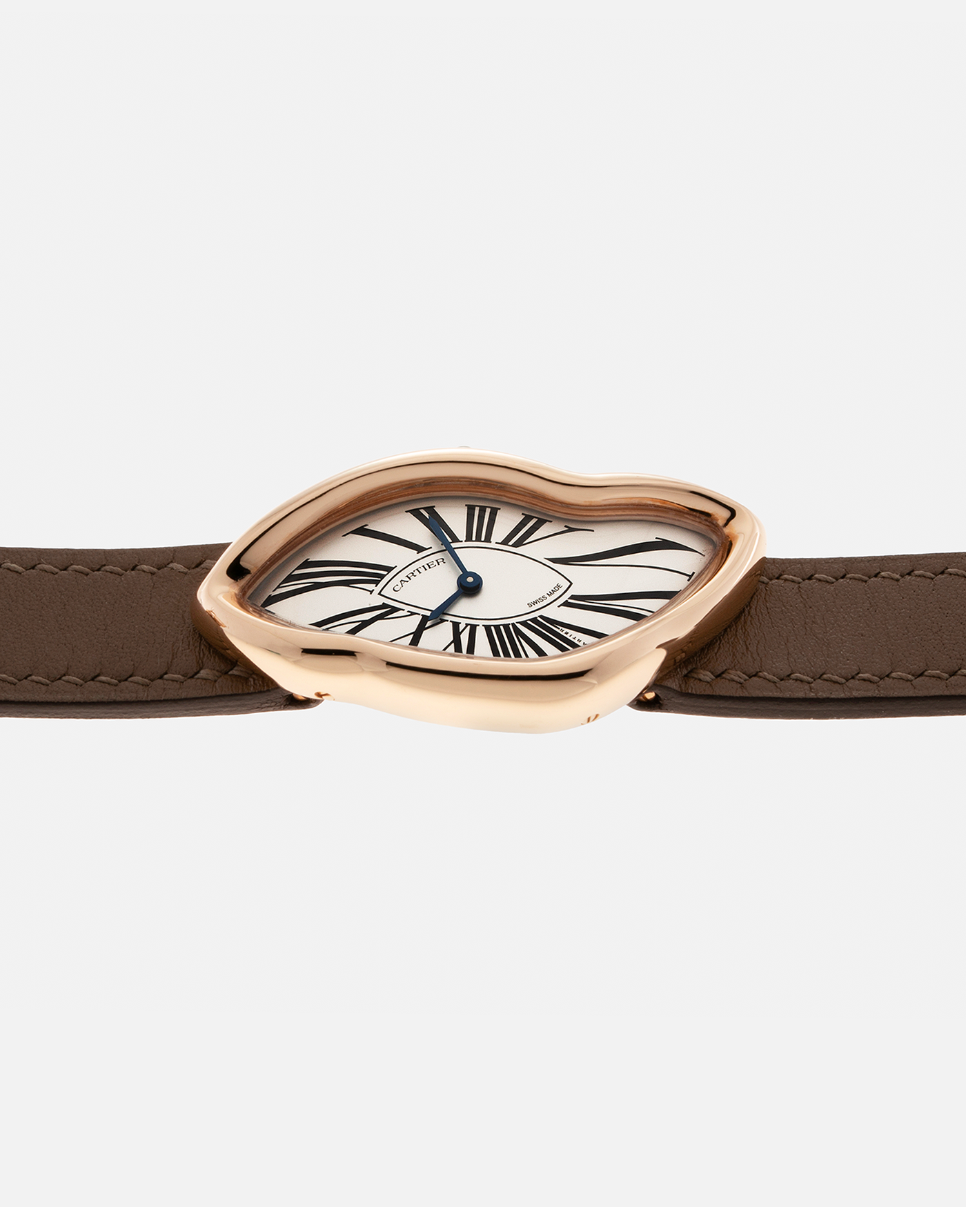 Brand: Cartier Year: 2023 Model: Crash Reference Number: WGCH0031, New Special Order Material: 18-carat Rose Gold Movement: Cartier Cal. 1917 MC, Manual-Winding Case Diameter: 42mm x 24mm (Asymmetrical Case) Strap: Cartier Tanned Leather Strap with Signed 18-carat Rose Gold Deployant Clasp, additional Woohoo Time Taupe Leather Strap