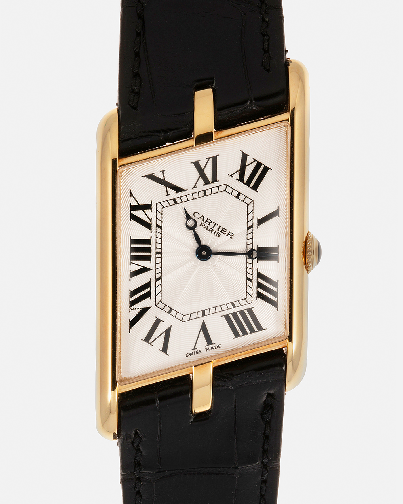 Brand: Cartier Year: 2006 Model: Tank Asymétrique CPCP, Limited Edition of 150 pieces Reference Number: 2842 Material: 18-carat Yellow Gold Movement: Cartier Cal. 9770 MC, Manual-Winding Case Diameter: 26.5mm x 41mm x 7.5mm Strap: Cartier Black Alligator Leather with Signed 18-carat Yellow Gold Deployant Clasp