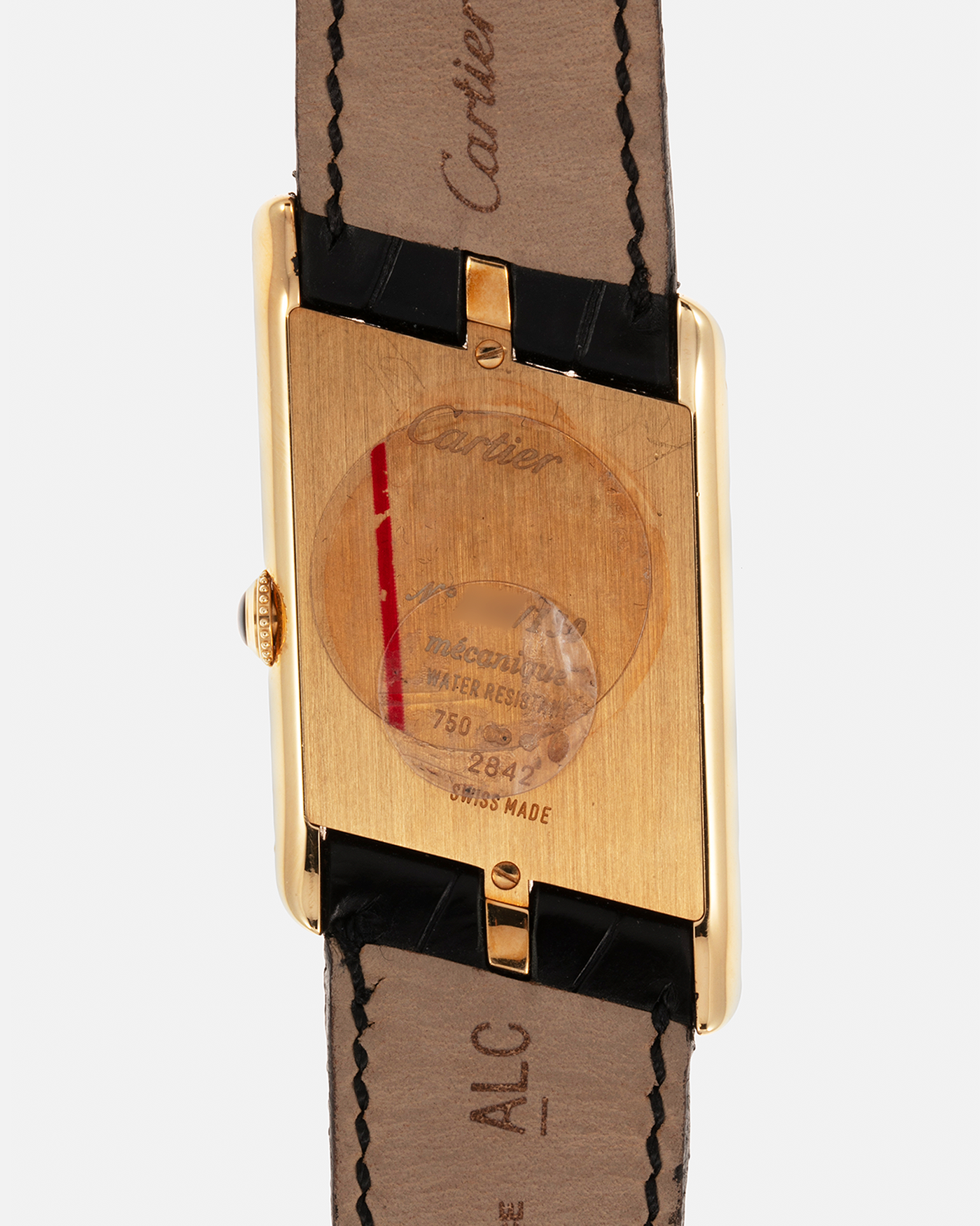 Brand: Cartier Year: 2006 Model: Tank Asymétrique CPCP, Limited Edition of 150 pieces Reference Number: 2842 Material: 18-carat Yellow Gold Movement: Cartier Cal. 9770 MC, Manual-Winding Case Diameter: 26.5mm x 41mm x 7.5mm Strap: Cartier Black Alligator Leather with Signed 18-carat Yellow Gold Deployant Clasp