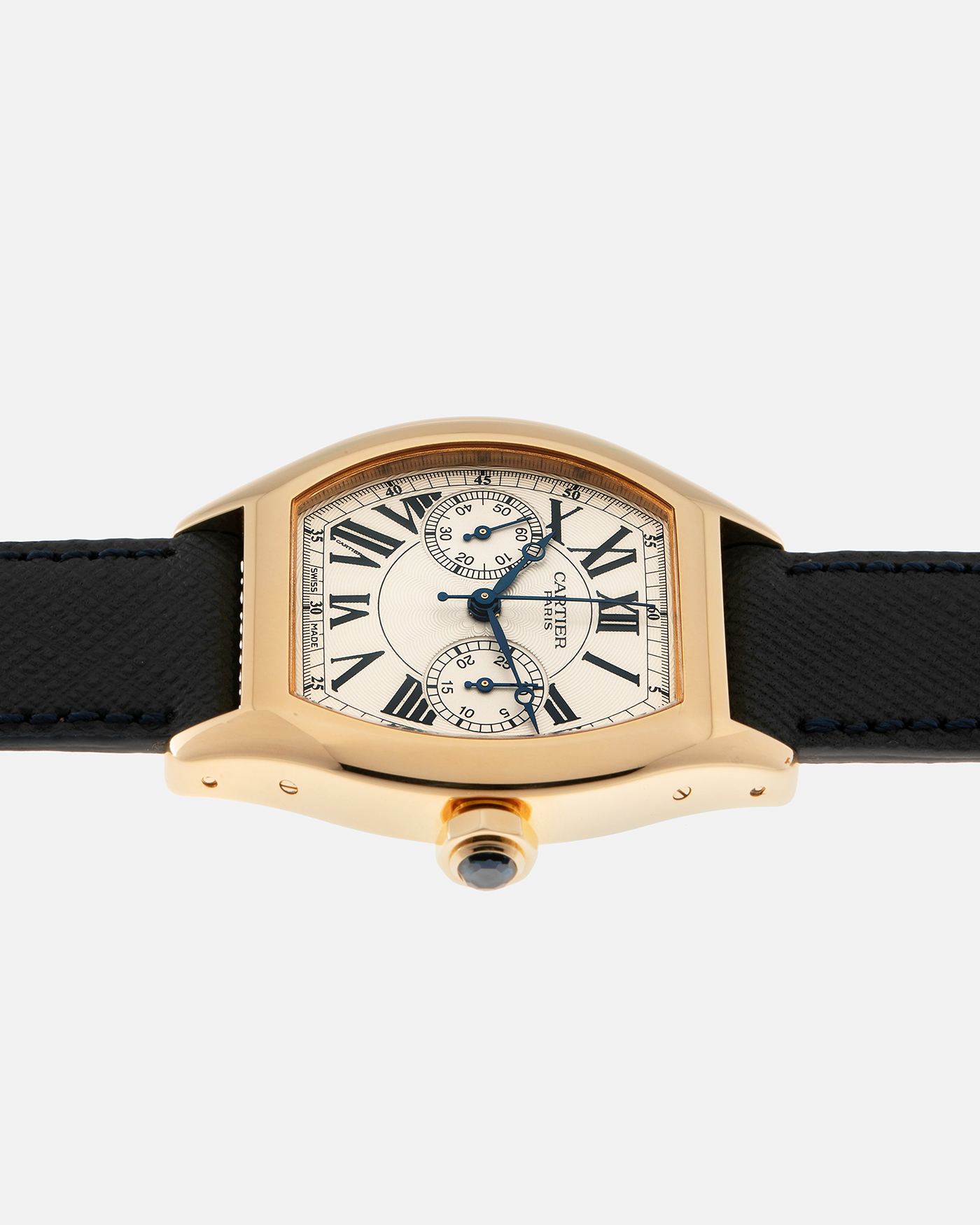 Brand: Cartier Year: 2000’s Model: Collection Privée Cartier Paris Tortue Monopoussoir Reference: 2356E Material: 18-carat Yellow Gold Movement: Cartier THA Cal. 045MC, Manual-Winding Case Diameter: 43mm x 35 mm Lug Width: 18mm Strap: Molequin Navy Blue Textured Calf Leather with Signed 18-carat Yellow Gold Deployant Clasp