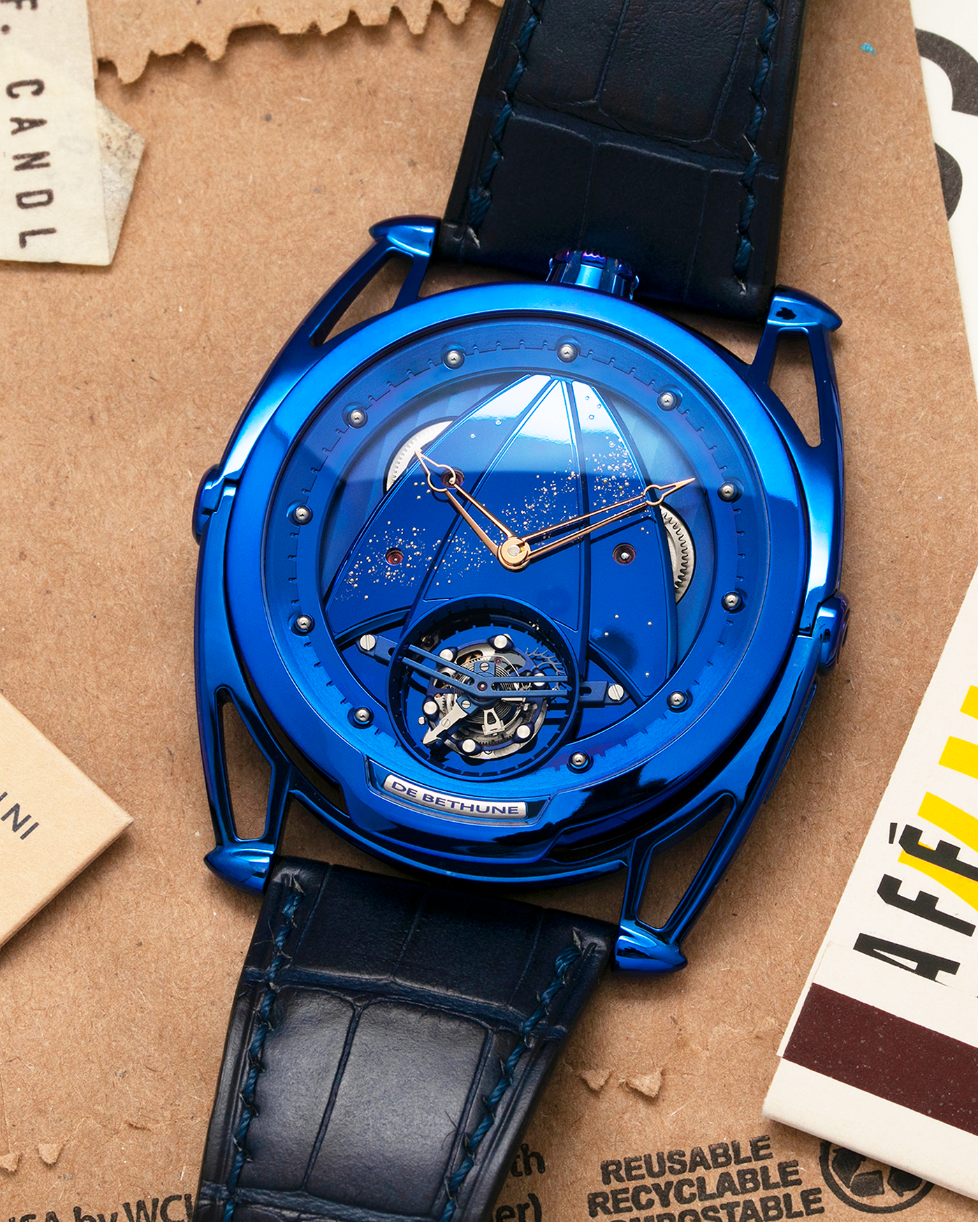 Brand: De Bethune Year: 2021 Model: Tourbillon Reference: DB28 ‘Kind of Blue’ Milky Way, Limited Edition of 5 Pieces Material: Blued Grade 5 Titanium Movement: Cal. DB2019, Manual-Winding Case Diameter: 43mm Strap: De Bethune Dark Blue Alligator Leather Strap with Signed Blued Titanium Tang Buckle, with additional De Bethune Dark Blue Tungsten Lizard Leather Strap