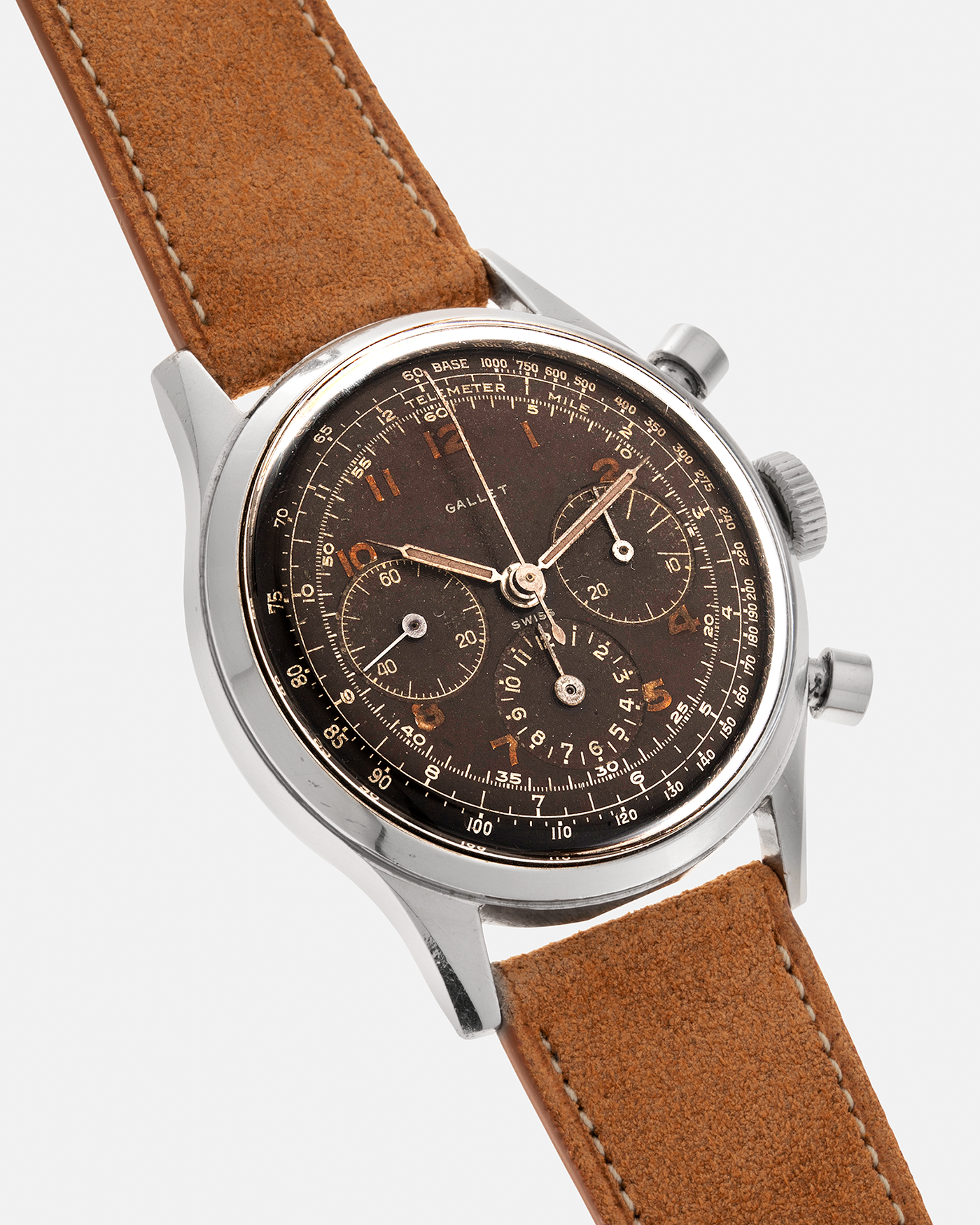 Brand: Gallet Year: 1950’s Model: Mutichron 12H Chronograph Serial Number: 933631 Material: Stainless Steel Movement: Excelsior Park 40, Manual-Winding Case Diameter: 37mm Strap: Nostime Sand Tan Suede Calf Leather Strap
