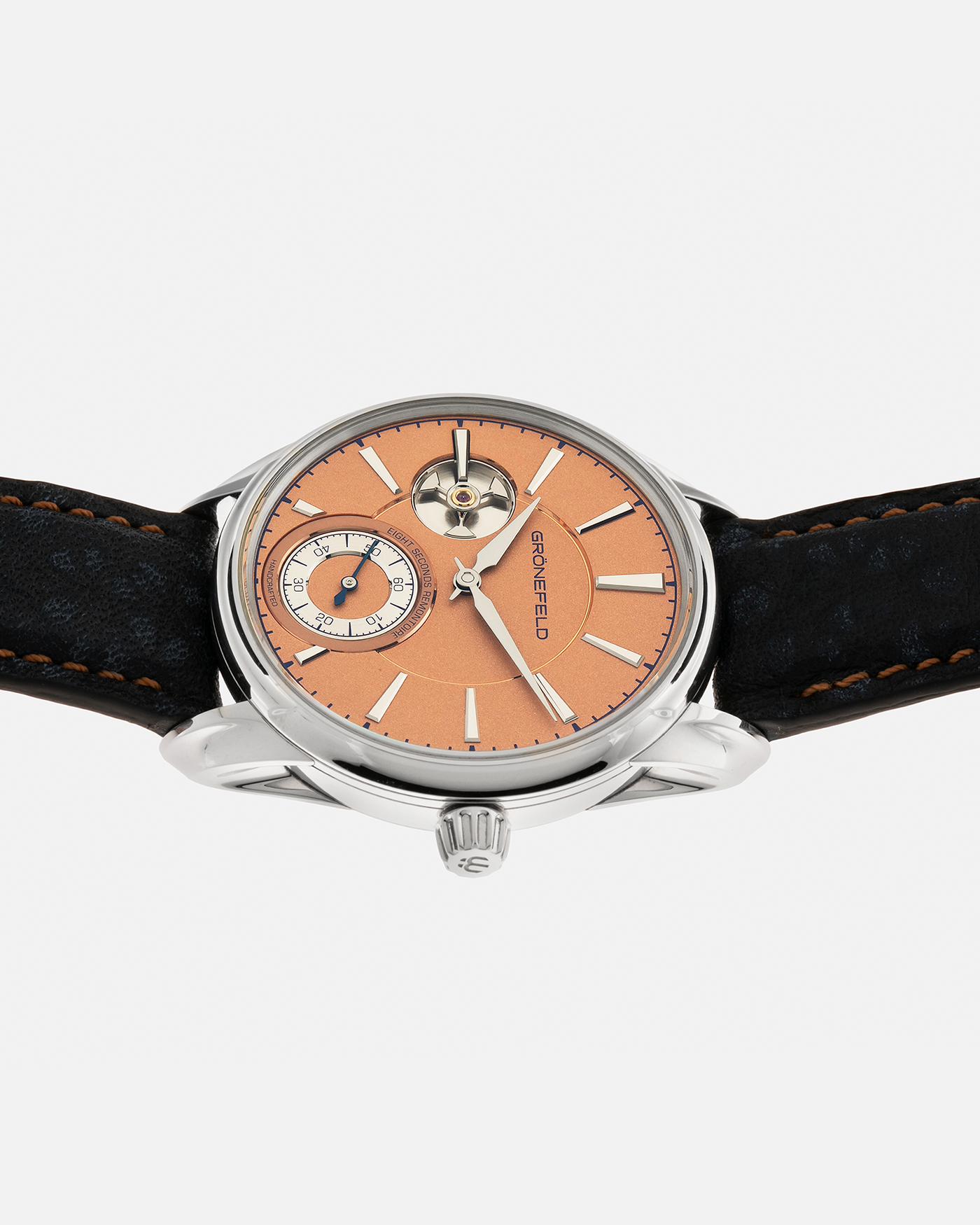 Brand: Grönefeld Year: XXXX Model: 1941 Remontoire ‘Salmon’ Material: Stainless Steel Movement: Grönefeld Cal. G-05, Manual-Winding Case Dimensions: 39.5mm x  10.5mm Lug Width: 20mm Strap: Grönefeld Blue Ostrich / Dutch Orange Leather Strap with Signed Stainless Steel 916L Tang Buckle