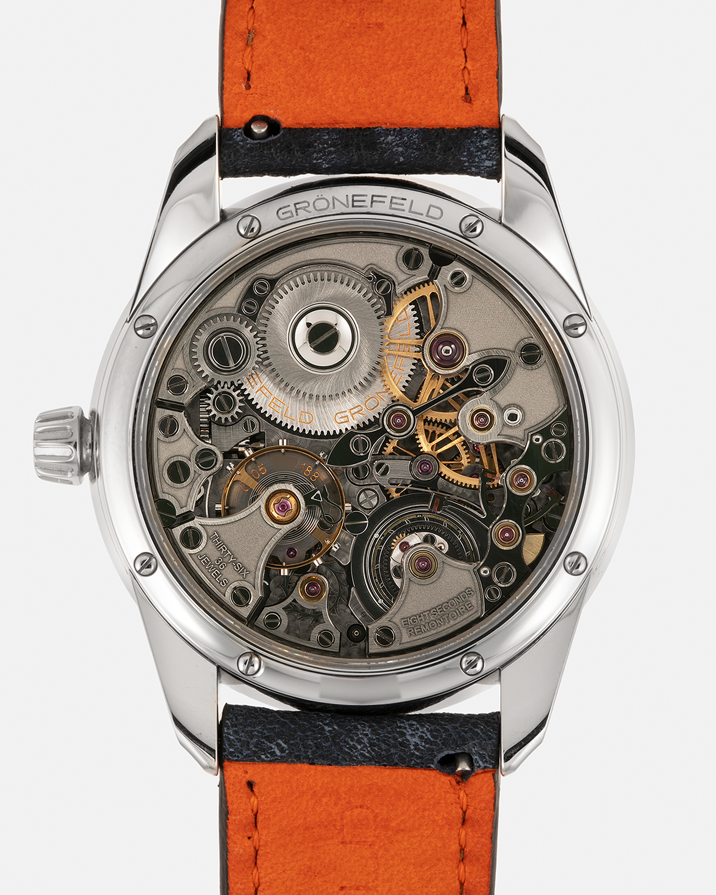 Brand: Grönefeld Year: XXXX Model: 1941 Remontoire ‘Salmon’ Material: Stainless Steel Movement: Grönefeld Cal. G-05, Manual-Winding Case Dimensions: 39.5mm x  10.5mm Lug Width: 20mm Strap: Grönefeld Blue Ostrich / Dutch Orange Leather Strap with Signed Stainless Steel 916L Tang Buckle
