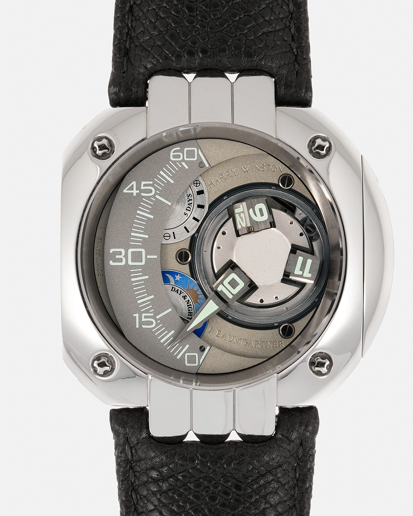 Brand: Harry Winston Year: 2005 Model: Opus V, Limited Edition of 45 pieces in Platinum Material: Platinum 950 Movement: Harry Winston Cal. HW1026 in ARCAP Alloy, Manual-Winding Case Diameter: 50mm Strap: Philips Grey Calf Leather Strap with Signed Platinum Tang Buckle