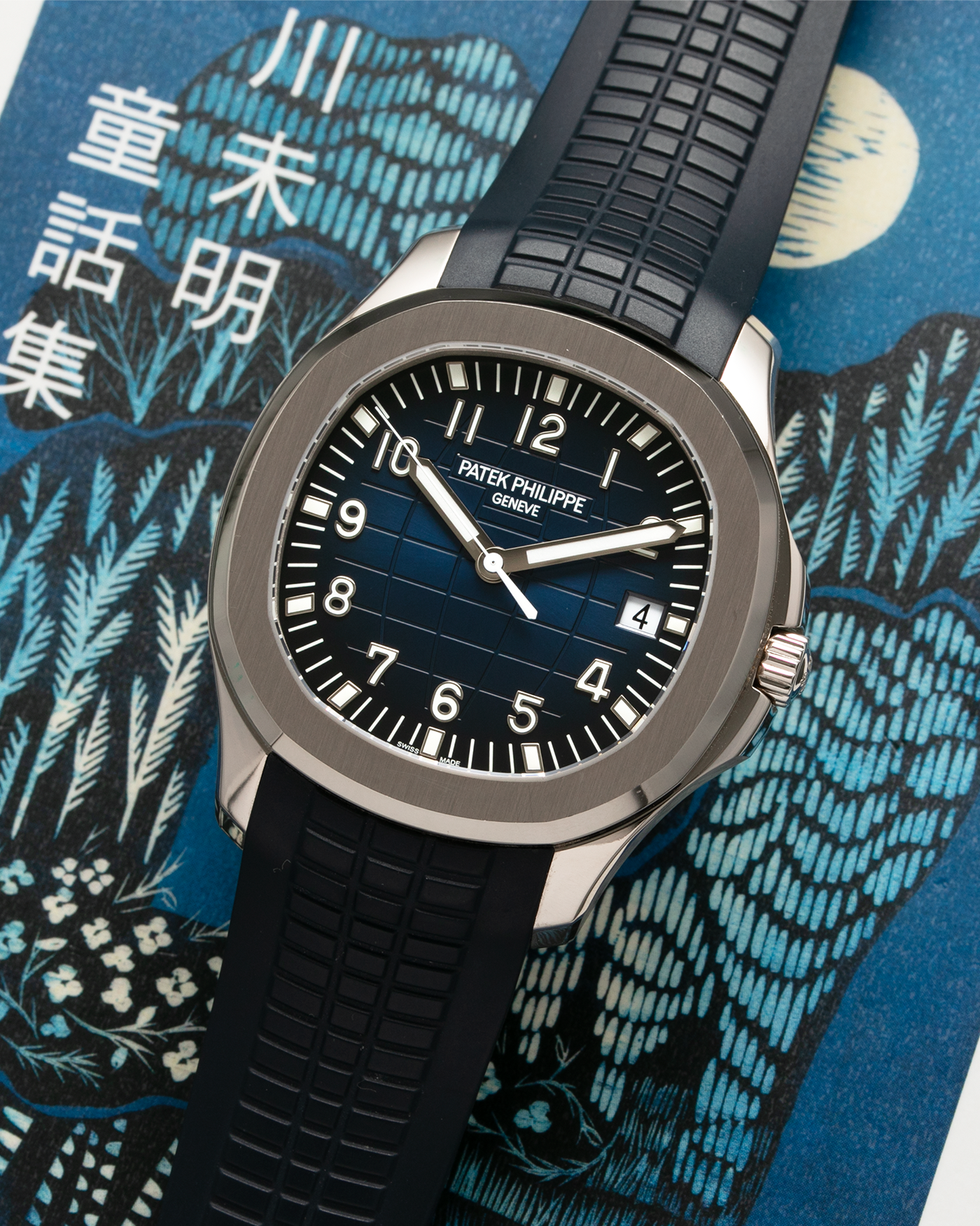 Brand: Patek Philippe Year: 2017 Model: Aquanaut Reference Number: 5168G-001 Material: 18-carat White Gold Movement: Patek Philippe Cal. 324 S C, Self-Winding Case Diameter: 42.2mm x 8.25mm Strap: Patek Philippe Aquanaut Tropical Composite Midnight Blue Strap with Signed 18-carat White Gold Deployant Clasp