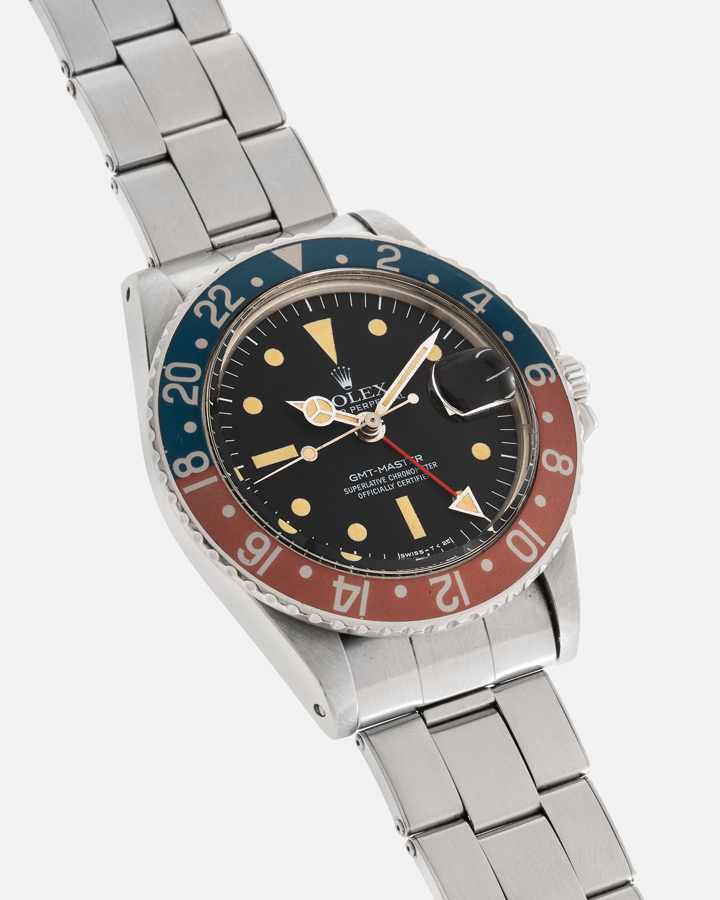 Brand: Rolex Year: 1976 Model: GMT-Master Reference Number: 1675 Serial Number: 420XXXX Material: Stainless Steel Movement: Rolex Cal. 1575, Self-Winding Case Diameter: 40mm Lug Width: 20mm Bracelet: Rolex Stainless Steel Folded Oyster Bracelet with Signed Deployant Clasp