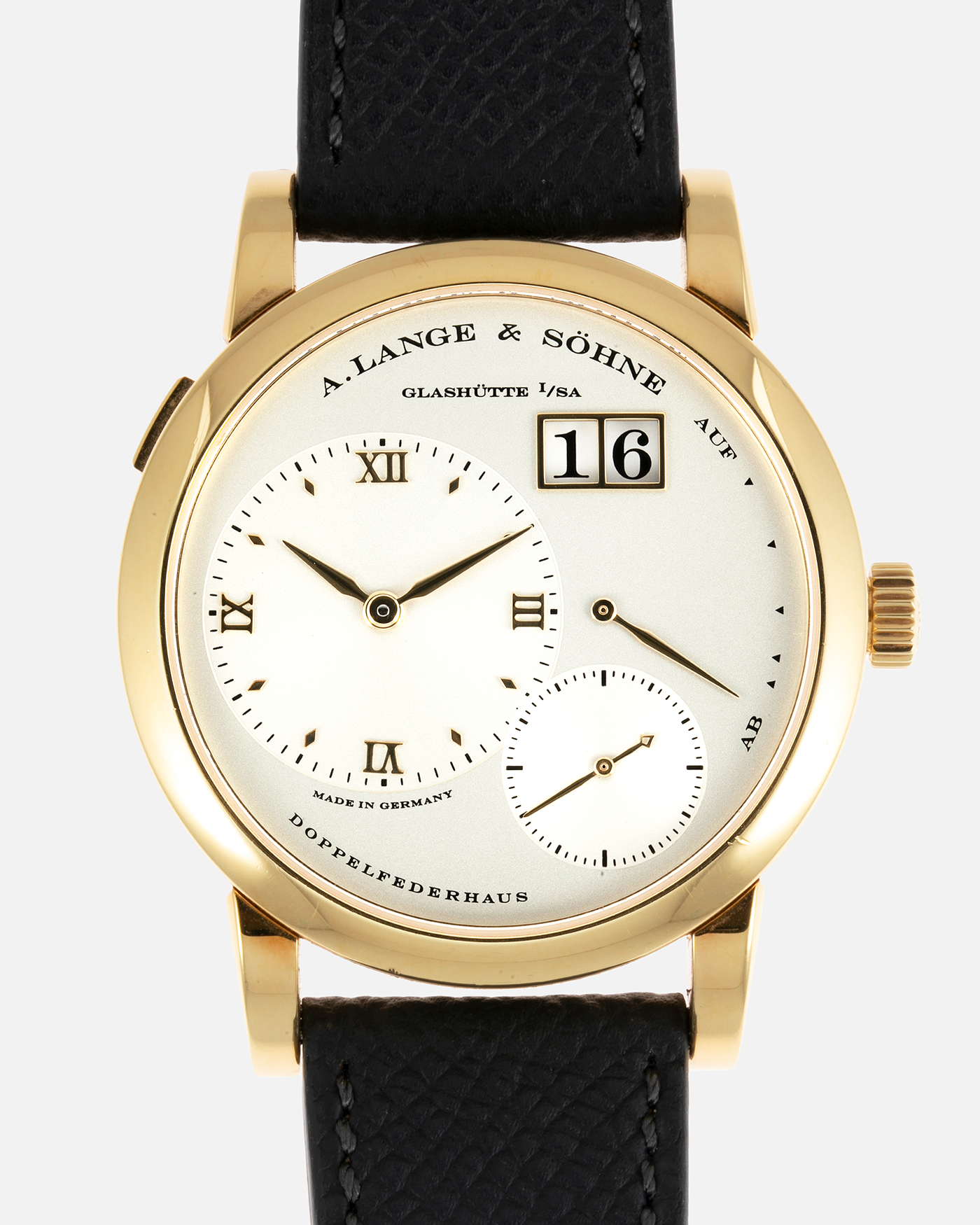 Brand: A. Lange & Söhne Year: 2000’s Model: Lange 1 Reference Number: 101.027 Material: 18-carat Yellow Gold Movement: Cal. L901.0, Manual-Winding Case Diameter: 38.5mm Bracelet/Strap: Molequin Anthracite Textured Calf Strap and A. Lange & Sohne Black Alligator Strap with 18k Yellow Gold Tang Buckle