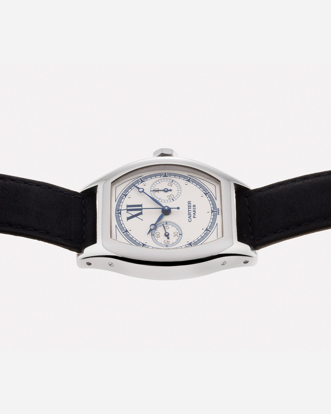 Brand: Cartier Year: 2000’s Model: CPCP Collection Prive Tortue Monopoussoir Reference: 2356 Material: 18k White Gold Movement: THA Cal. 045MC Case Diameter: 43 x 35 mm Strap: Navy Blue Suede Calf Strap with separate 18k Cartier White Gold Deployant