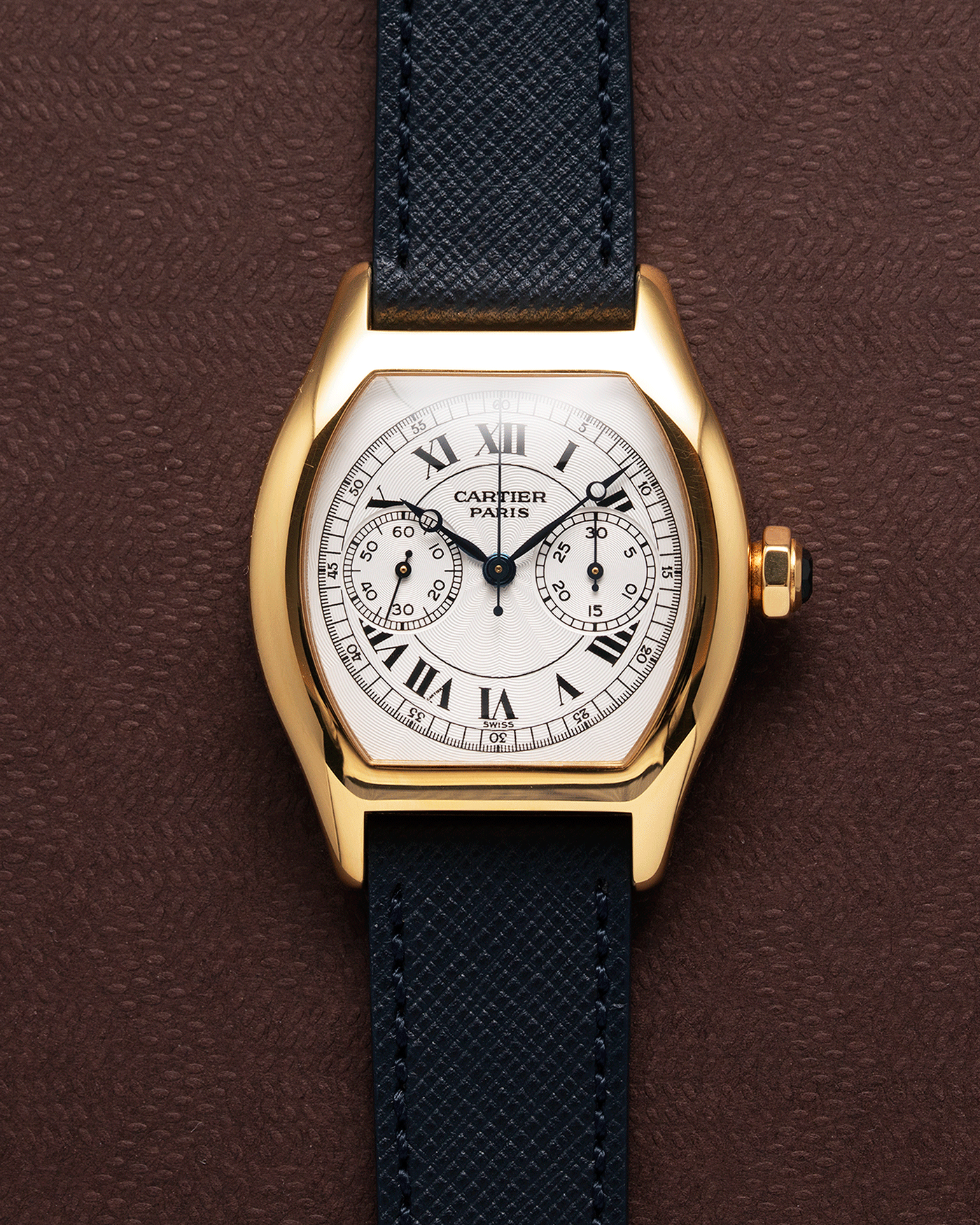 Brand: Cartier Year: 2000’s Model: CPCP Collection Prive Tortue Monopoussoir Reference: 2356E Material: 18k Yellow Gold Movement: THA Cal. 045MC Case Diameter: 43 x 35 mm Strap: Molequin Navy Blue Textured Calf with 18k Cartier Yellow Gold DeployantBrand: Cartier Year: 2000’s Model: CPCP Collection Prive Tortue Monopoussoir Reference: 2356E Material: 18k Yellow Gold Movement: THA Cal. 045MC Case Diameter: 43 x 35 mm Strap: Molequin Navy Blue Textured Calf with 18k Cartier Yellow Gold Deployant