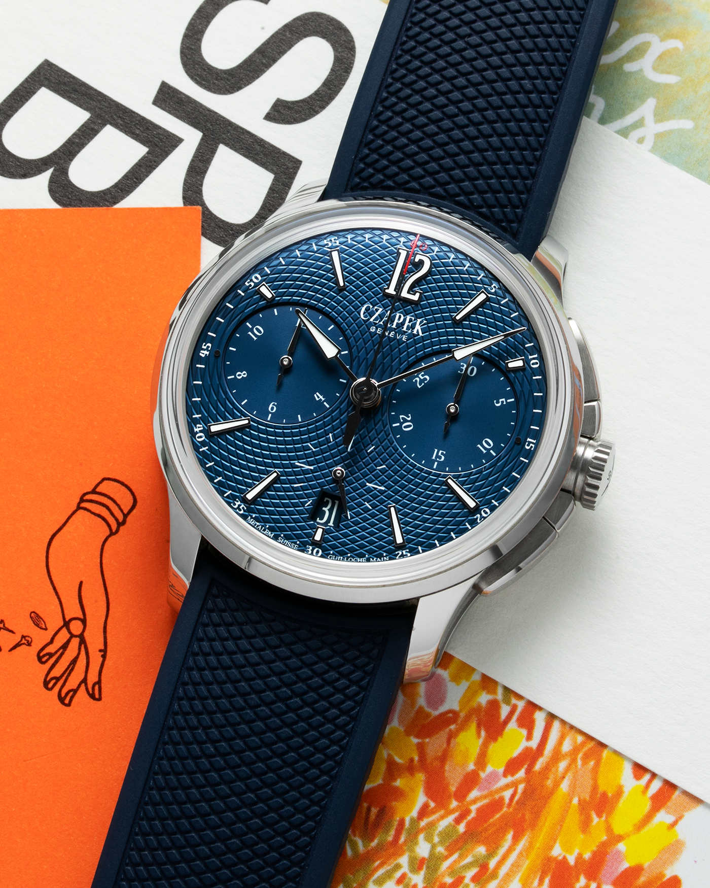 Brand: Czepek  Year: 2018 Model: Faubourg de Cracovie Chronograph L’Heuere Bleu Material: Stainless Steel Movement: Cal. SXH3 Case Diameter: 41.5mm Strap: Czapek Blue Textured Rubber Strap and Stainless Steel Deployant
