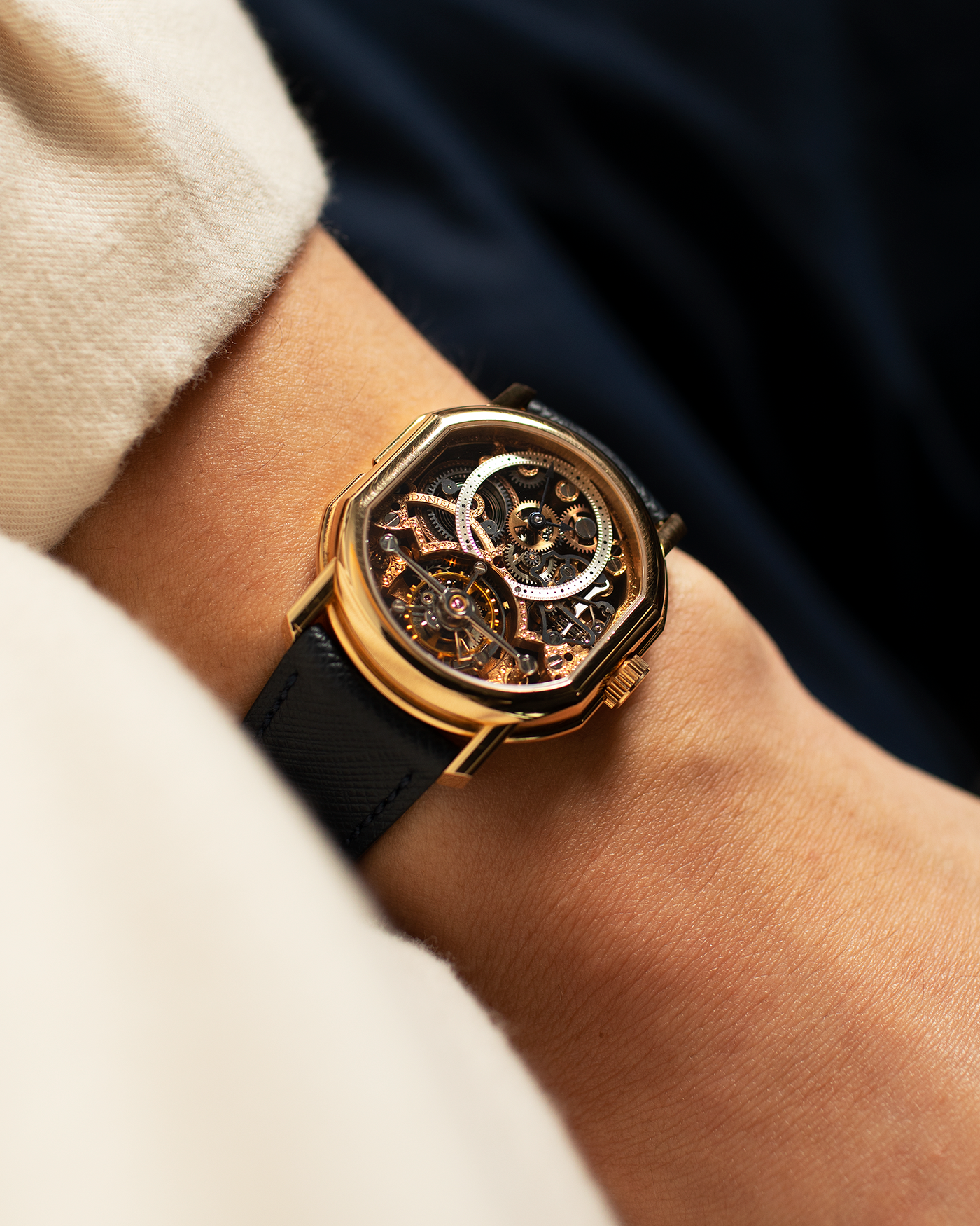 Brand: Daniel Roth Year: 1990’s Model: 2187 Material: 18k Yellow Gold Movement: Cal. DR 307 One-Minute Tourbillon Regulator Case Diameter: 35mm X 38mm Strap: Molequin Navy Blue Textured Calf and18k Yellow Gold Tang Buckle