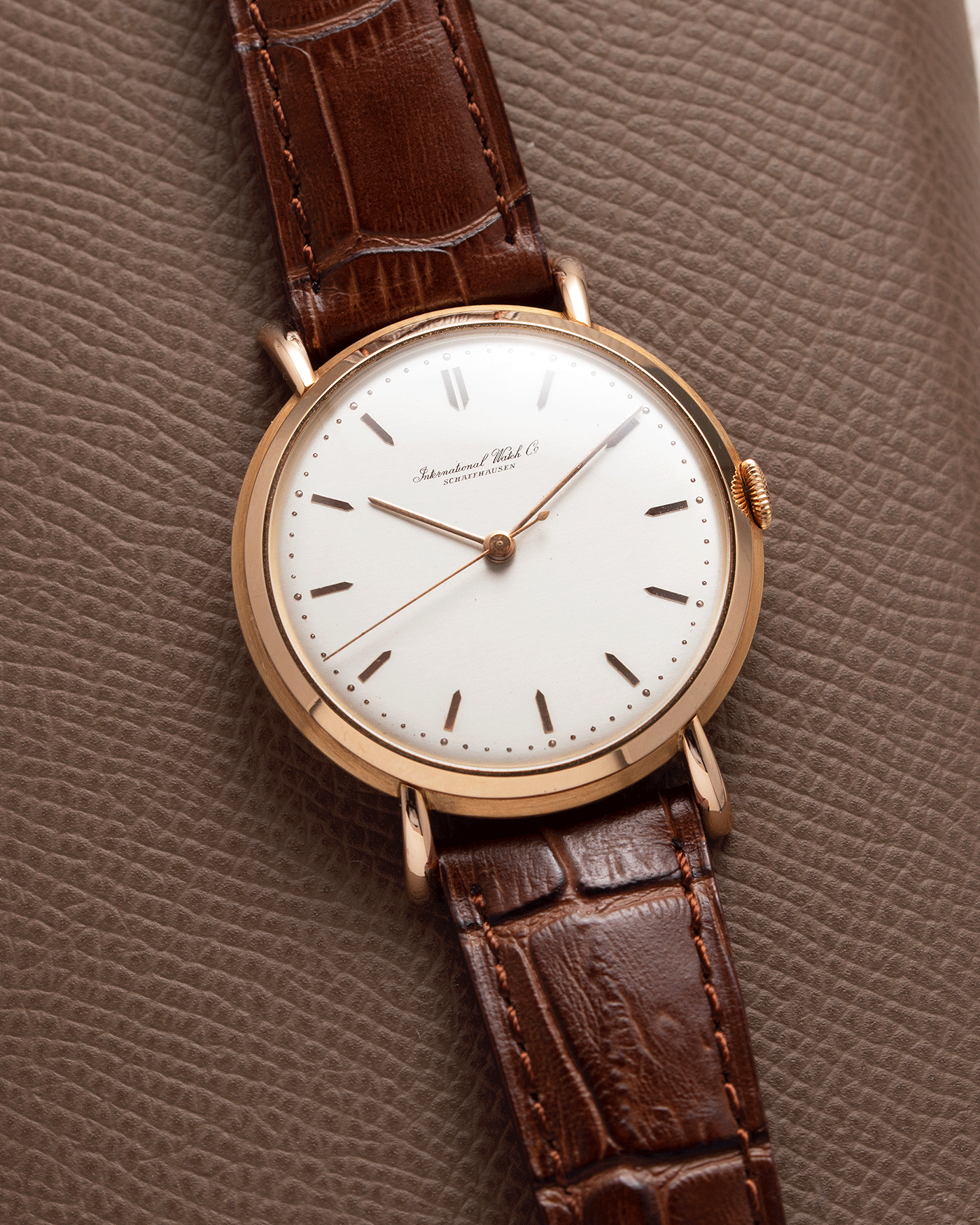 Brand: IWC Year: 1949 Serial Number: 1193964 Material: 18k Rose Gold Movement: In-house Cal. 89 Case Diameter: 36mm Lug Width: 18mm Bracelet/Strap: Brown Textured Leather Strap with Gold Plated Buckle