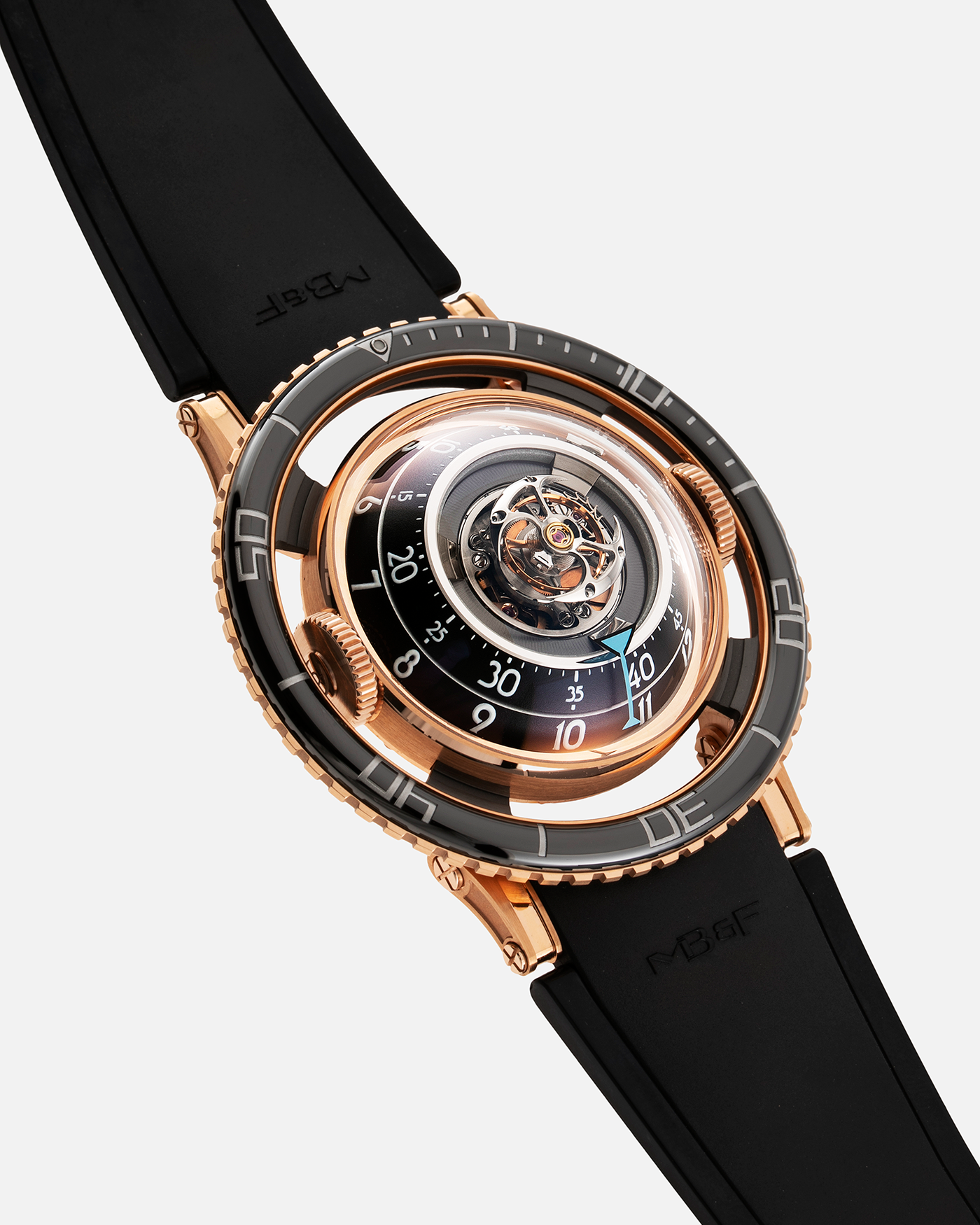 Brand: MB&F Year: 2022 Model: HM7 Aquapod Material: 18k Rose Gold Movement: In-House 3D Vertical Architecture MB&F HM7 Tourbillon Case Diameter: 53.8mm X 21.3mm With Articulating Lugs Bracelet/Strap: MB&F Black Rubber Strap with 18k Rose Gold Deployant Clasp
