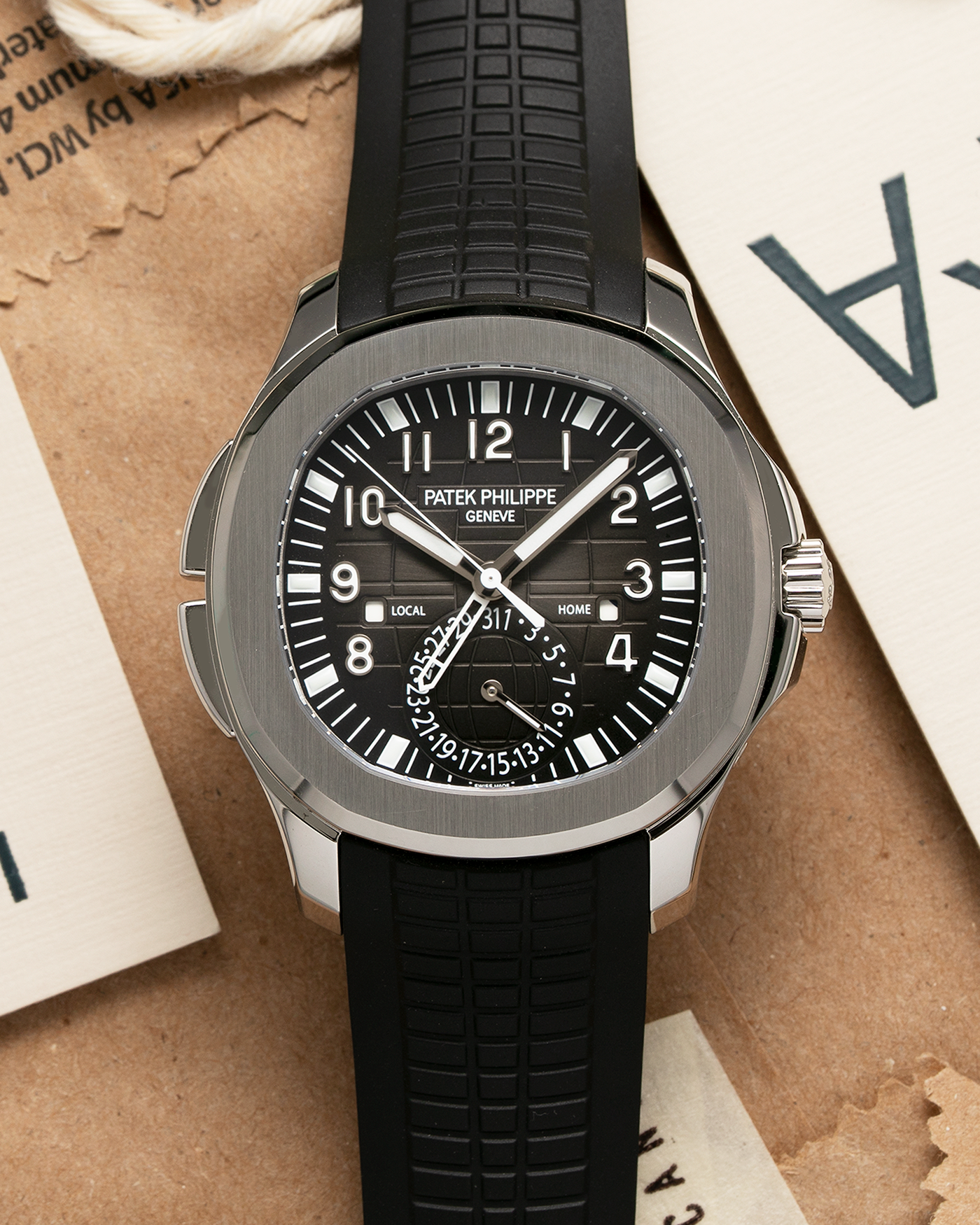 Brand: Patek Philippe Year: 2021 Model: Aquanaut Reference Number: 5164A Material: Stainless Steel Movement: Calibre 324 C FUS Case Diameter: 40.8mm Bracelet: Uncut Patek Philippe Aquanaut Black Tropical Rubber Strap with Signed Deployant Clasp