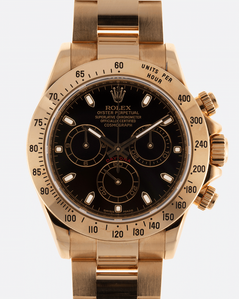 Rolex daytona full top gold black dial