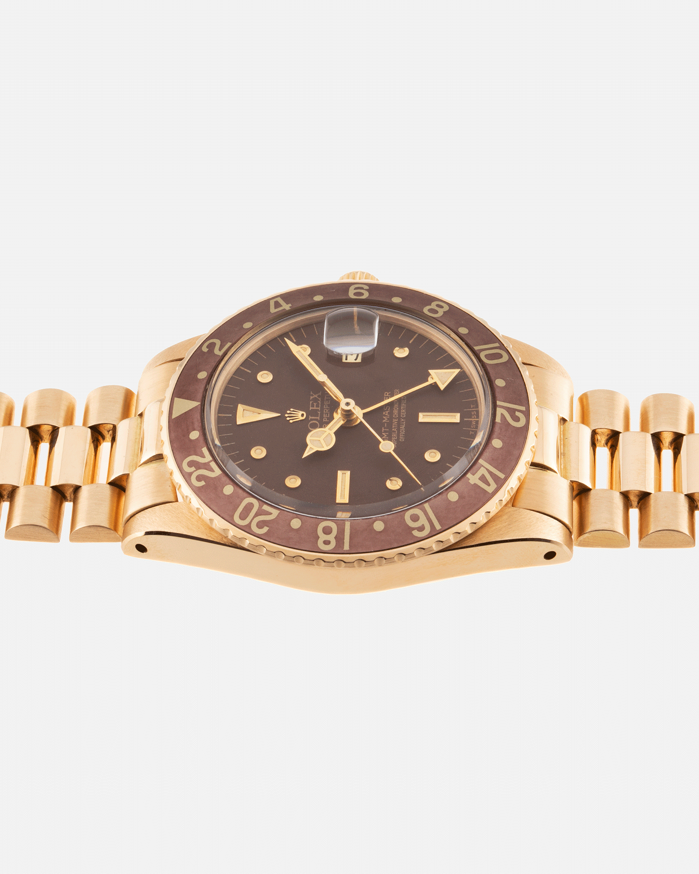 Brand: Rolex Year: 1978 Model: GMT-Master Reference Number: 1675 Serial Number: 5.3 mil Material: 18k Yellow Gold Movement: Cal. 1570 Case Diameter: 40mm Lug Width: 20mm Strap: 18k Yellow Gold Rolex President Bracelet