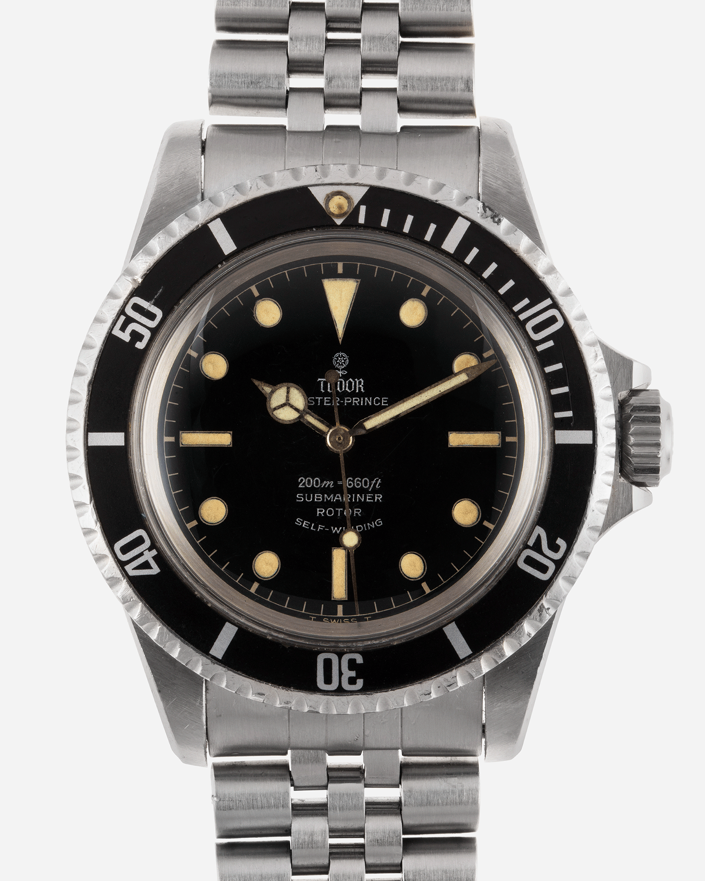 Brand: Tudor Year: 56XXXX Model: Submariner Reference Number: 7928 Serial Number: 1966 Material: Stainless Steel Movement: Cal. 390 Case Diameter: 39mm Lug Width: 20mm Bracelet: Rolex 62510H Jubilee with 555B End Links