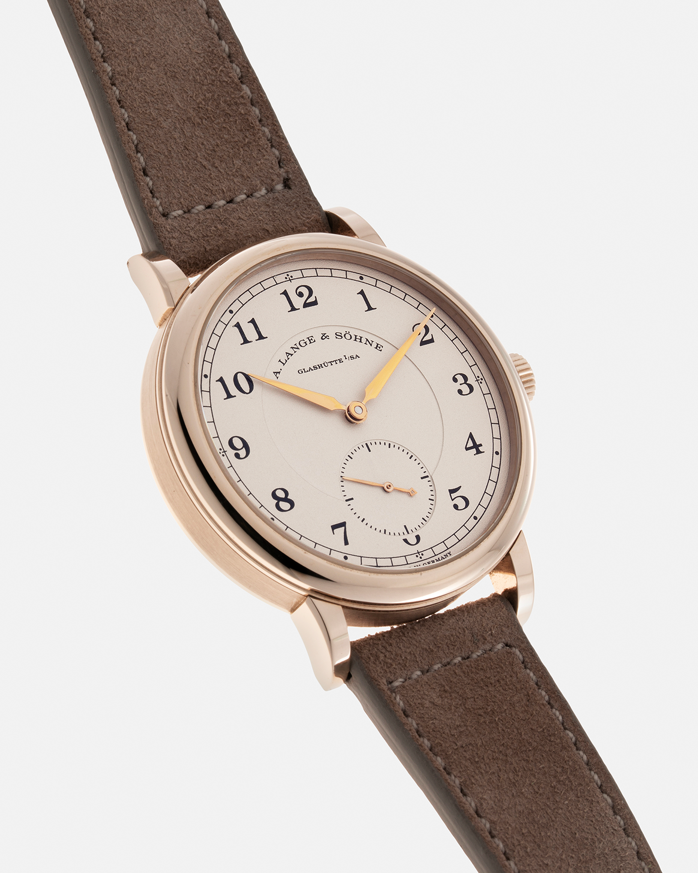 Brand: A. Lange & Söhne Year: 2015 Model: 1815 200th Anniversary F. A. Lange, Limited Edition of 200 pieces Ref Number: 236.050 Material: Honey Gold Movement: A. Lange & Söhne Cal. L051.1, Manual-Winding Case Diameter: 40m Lug Width: 20mm Strap: Molequin Taupe Suede Strap with Signed Honey Gold Tang Buckle, additional A. Lange & Söhne Black Alligator Leather Strap