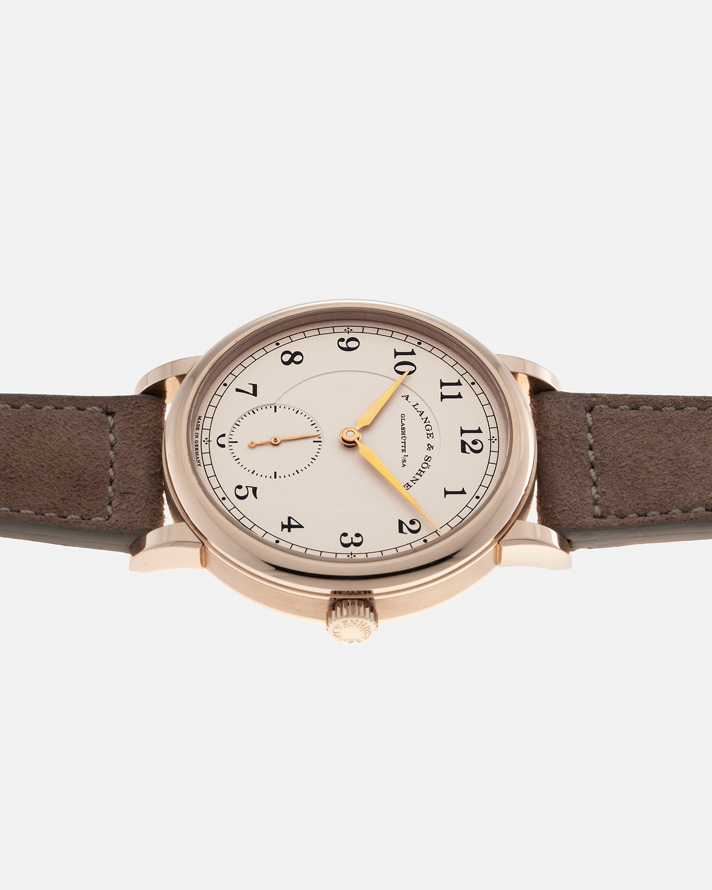 Brand: A. Lange & Söhne Year: 2015 Model: 1815 200th Anniversary F. A. Lange, Limited Edition of 200 pieces Ref Number: 236.050 Material: Honey Gold Movement: A. Lange & Söhne Cal. L051.1, Manual-Winding Case Diameter: 40m Lug Width: 20mm Strap: Molequin Taupe Suede Strap with Signed Honey Gold Tang Buckle, additional A. Lange & Söhne Black Alligator Leather Strap