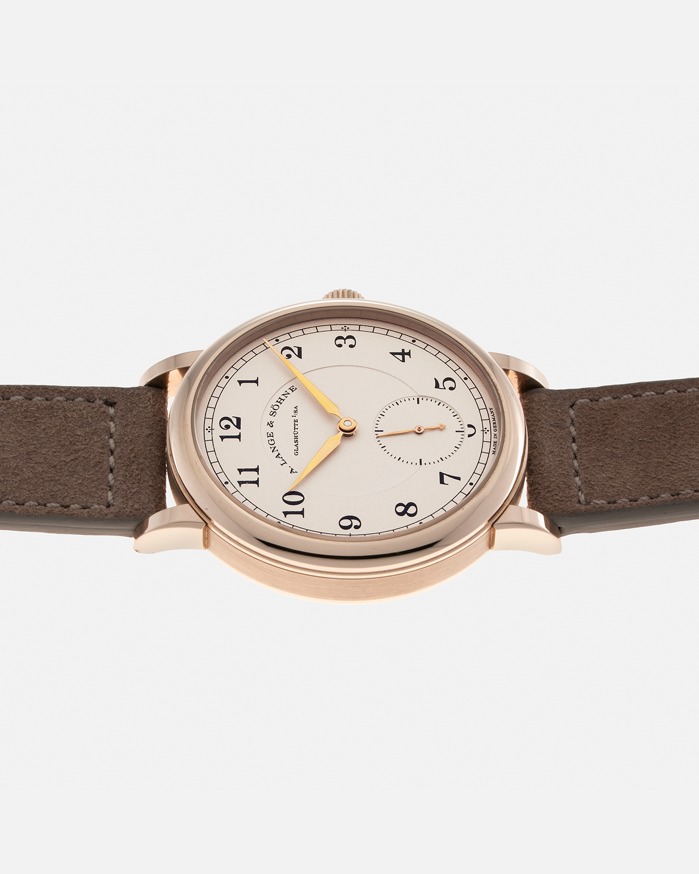 Brand: A. Lange & Söhne Year: 2015 Model: 1815 200th Anniversary F. A. Lange, Limited Edition of 200 pieces Ref Number: 236.050 Material: Honey Gold Movement: A. Lange & Söhne Cal. L051.1, Manual-Winding Case Diameter: 40m Lug Width: 20mm Strap: Molequin Taupe Suede Strap with Signed Honey Gold Tang Buckle, additional A. Lange & Söhne Black Alligator Leather Strap