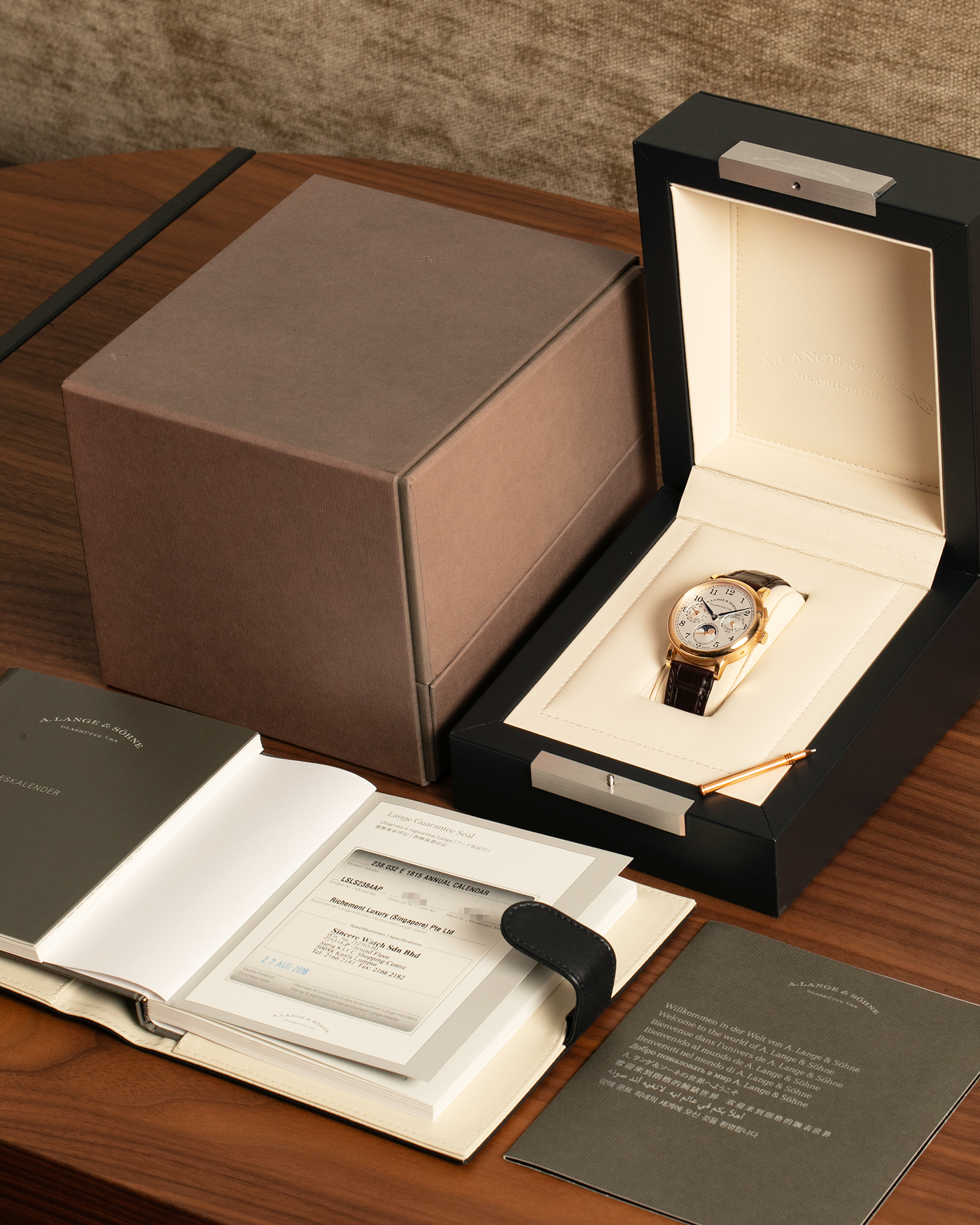 Brand: A. Lange & Söhne
Year: 2018
Model: 1815 Annual Calendar
Material: 18k Rose Gold
Movement: Manual Winding L051.3
Case Diameter: 40mm
Bracelet/Strap: A. Lange & Söhne Dark Brown Alligator Strap with signed 18k Rose Gold Tang Buckle