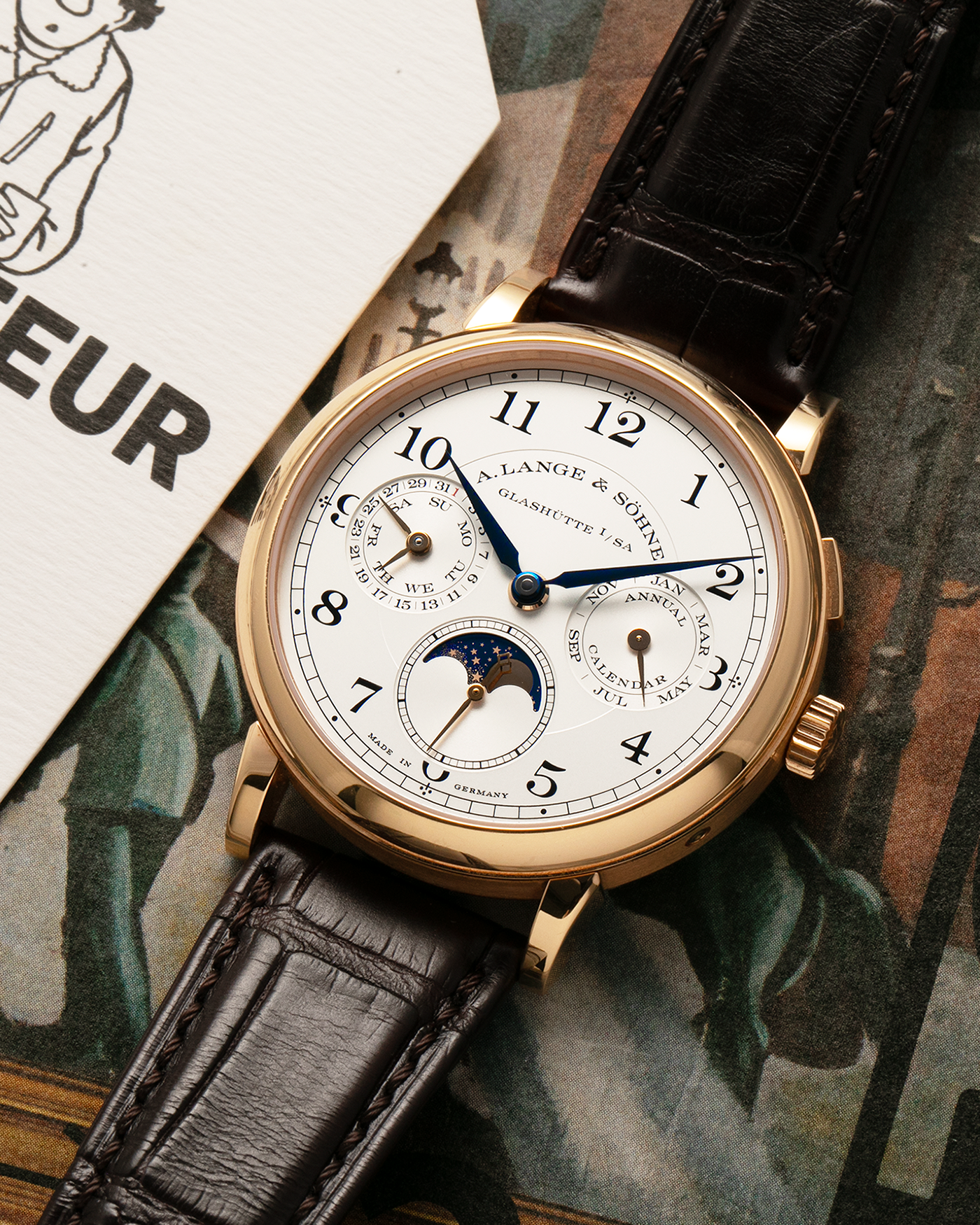 Brand: A. Lange & Söhne
Year: 2018
Model: 1815 Annual Calendar
Material: 18k Rose Gold
Movement: Manual Winding L051.3
Case Diameter: 40mm
Bracelet/Strap: A. Lange & Söhne Dark Brown Alligator Strap with signed 18k Rose Gold Tang Buckle
