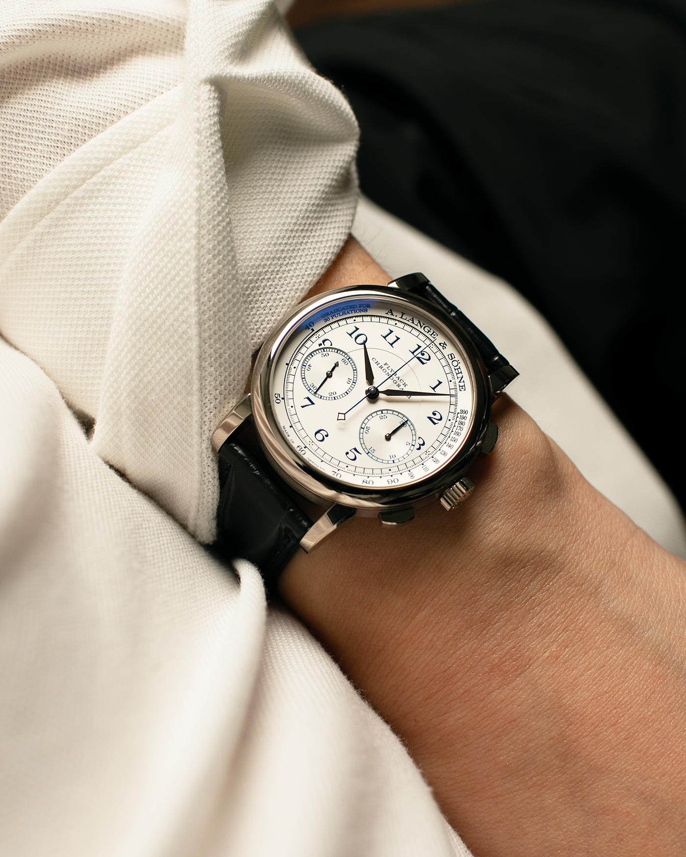 Brand: A. Lange & Söhne
Year: 2017
Model: 1815 Chronograph Boutique Edition
Reference Number: 414.026
Material: 18-carat White Gold
Movement: A. Lange & Söhne Cal. L951.5, Manual-Winding
Case Dimensions: 39.5mm x 11mm (Lug-to-Lug 48mm)
Lug Width: 20mm
Strap: A. Lange & Söhne Black Alligator Strap with signed 18-carat White Gold Tang Buckle