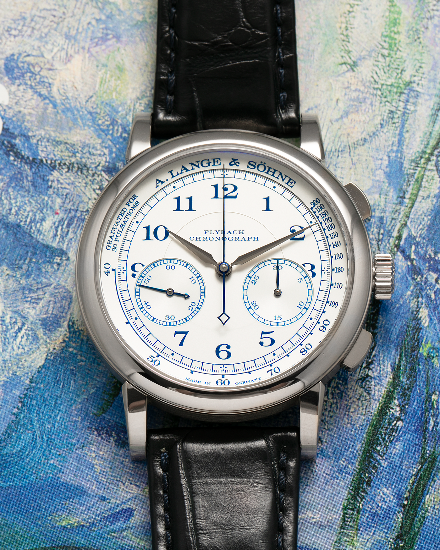 Brand: A. Lange & Söhne
Year: 2017
Model: 1815 Chronograph Boutique Edition
Reference Number: 414.026
Material: 18-carat White Gold
Movement: A. Lange & Söhne Cal. L951.5, Manual-Winding
Case Dimensions: 39.5mm x 11mm (Lug-to-Lug 48mm)
Lug Width: 20mm
Strap: A. Lange & Söhne Black Alligator Strap with signed 18-carat White Gold Tang Buckle