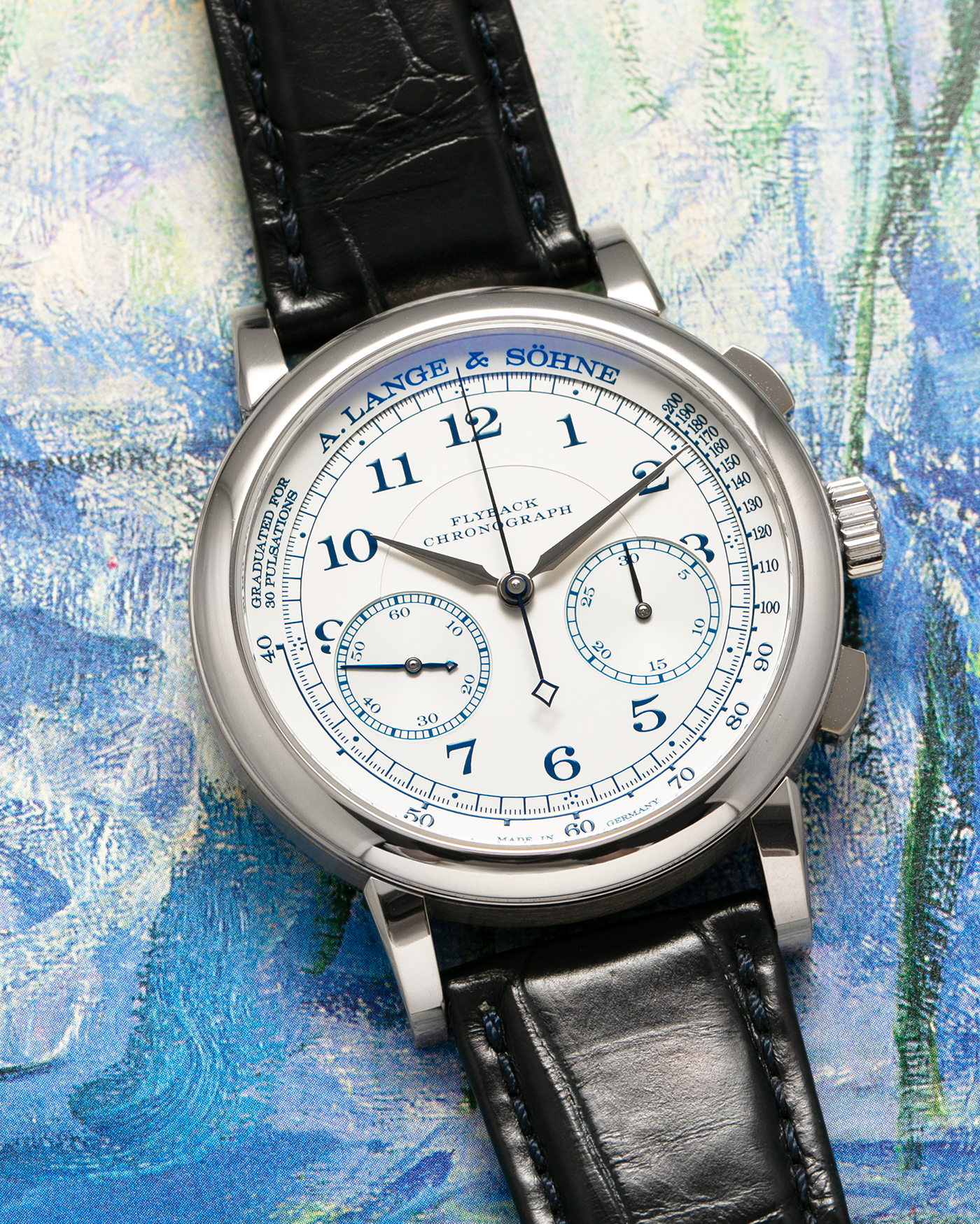 Brand: A. Lange & Söhne
Year: 2017
Model: 1815 Chronograph Boutique Edition
Reference Number: 414.026
Material: 18-carat White Gold
Movement: A. Lange & Söhne Cal. L951.5, Manual-Winding
Case Dimensions: 39.5mm x 11mm (Lug-to-Lug 48mm)
Lug Width: 20mm
Strap: A. Lange & Söhne Black Alligator Strap with signed 18-carat White Gold Tang Buckle