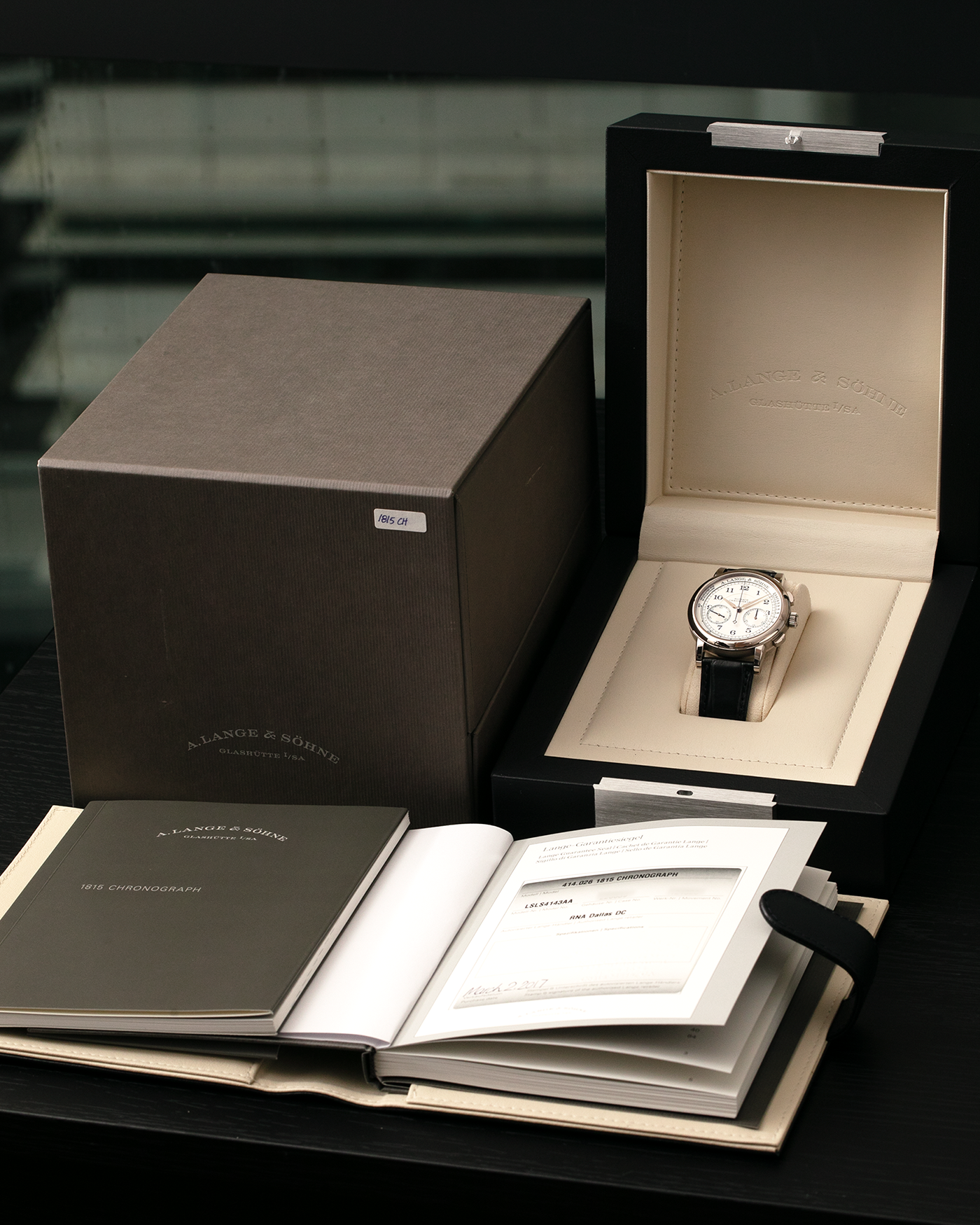 Brand: A. Lange & Söhne
Year: 2017
Model: 1815 Chronograph Boutique Edition
Reference Number: 414.026
Material: 18-carat White Gold
Movement: A. Lange & Söhne Cal. L951.5, Manual-Winding
Case Dimensions: 39.5mm x 11mm (Lug-to-Lug 48mm)
Lug Width: 20mm
Strap: A. Lange & Söhne Black Alligator Strap with signed 18-carat White Gold Tang Buckle