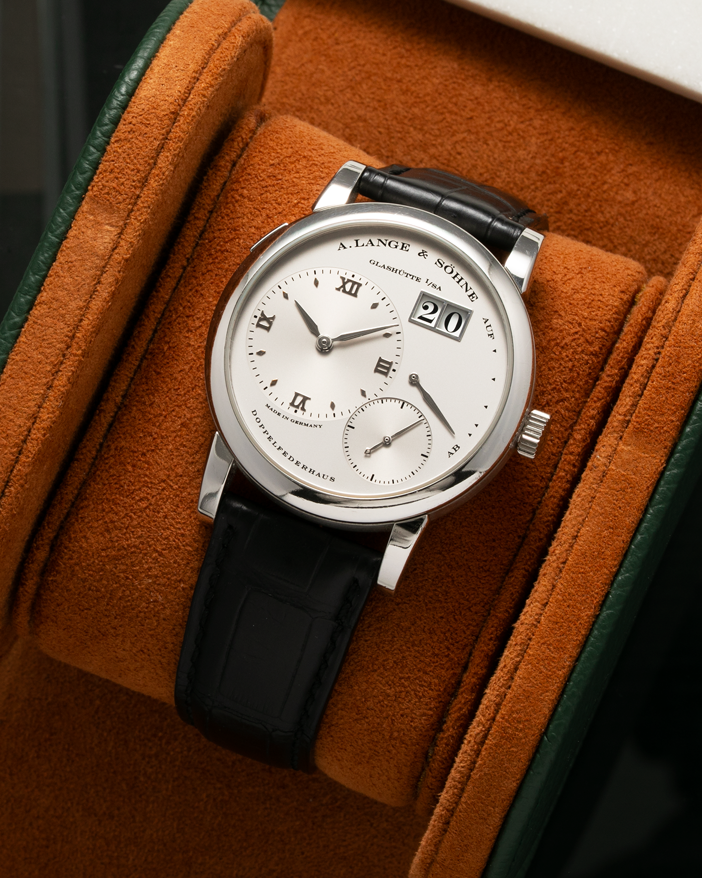 Brand: A. Lange & Söhne Year: 2000’s Model: Lange 1  Reference Number: 101.025 ‘Stealth’ Material: Platinum 950 Movement: A. Lange & Söhne Cal. L901.0, Manual-Winding Case Diameter: 38.5mm x 9.8mm Lug Width: 20mm Strap: A. Lange & Söhne Black Alligator Leather Strap with Signed Platinum 950 Tang Buckle