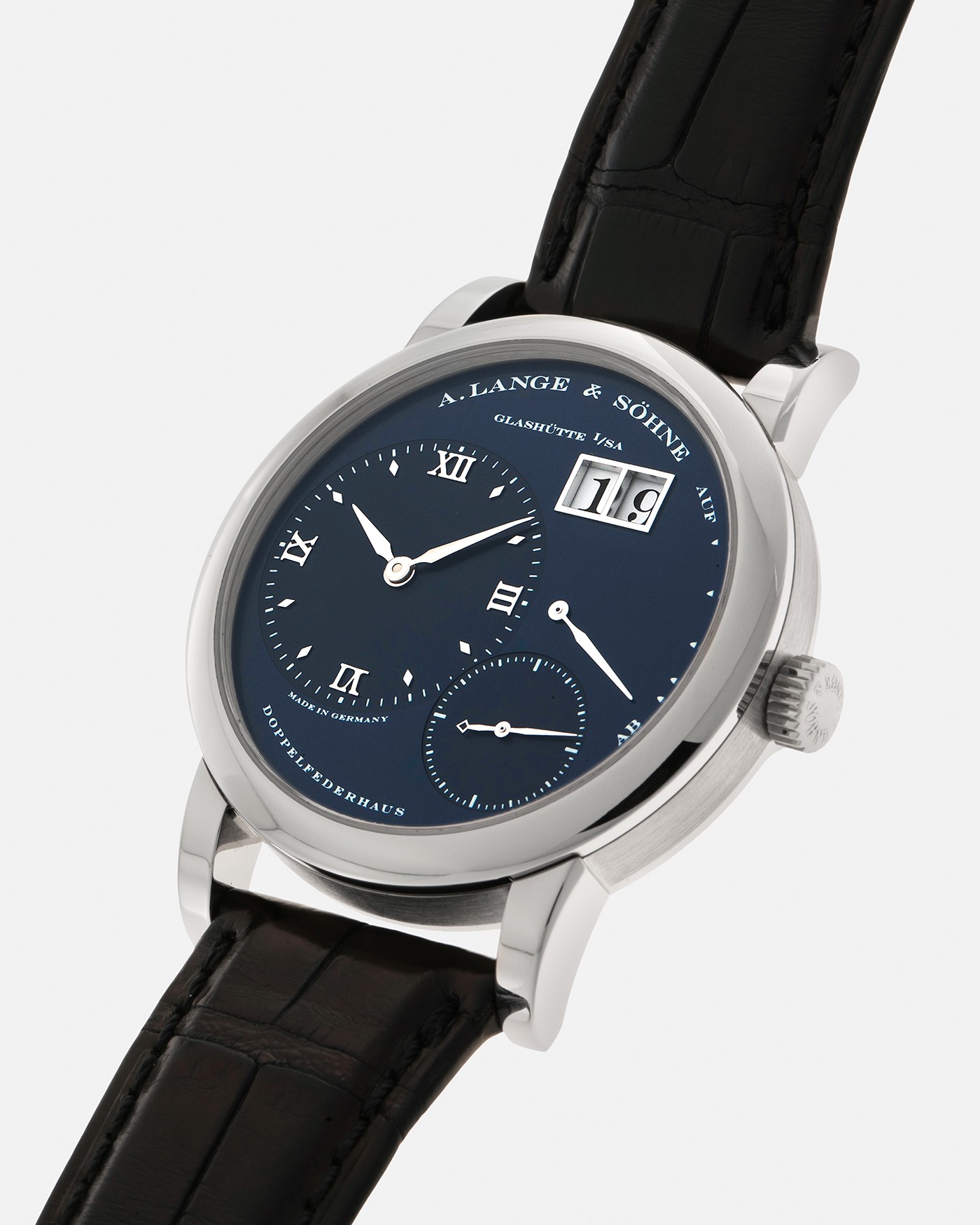 Brand: A. Lange & Söhne
Year: 2000’s
Model: Lange 1
Reference Number: 101.027
Material: 18-carat White Gold
Movement: A. Lange & Söhne Cal. L901.5, Manual Winding
Case Dimensions: 38.5mm x 9.5mm (Lug-to-Lug 47mm)
Lug Width: 20mm
Strap: A. Lange & Söhne Black Alligator Leather Strap with Signed 18-carat White Gold Tang Buckle
