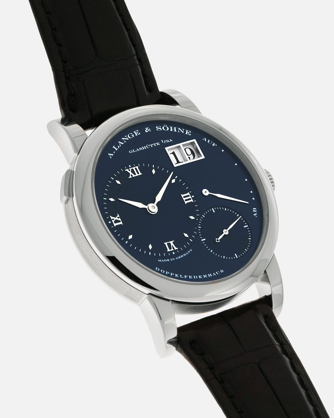 Brand: A. Lange & Söhne
Year: 2000’s
Model: Lange 1
Reference Number: 101.027
Material: 18-carat White Gold
Movement: A. Lange & Söhne Cal. L901.5, Manual Winding
Case Dimensions: 38.5mm x 9.5mm (Lug-to-Lug 47mm)
Lug Width: 20mm
Strap: A. Lange & Söhne Black Alligator Leather Strap with Signed 18-carat White Gold Tang Buckle