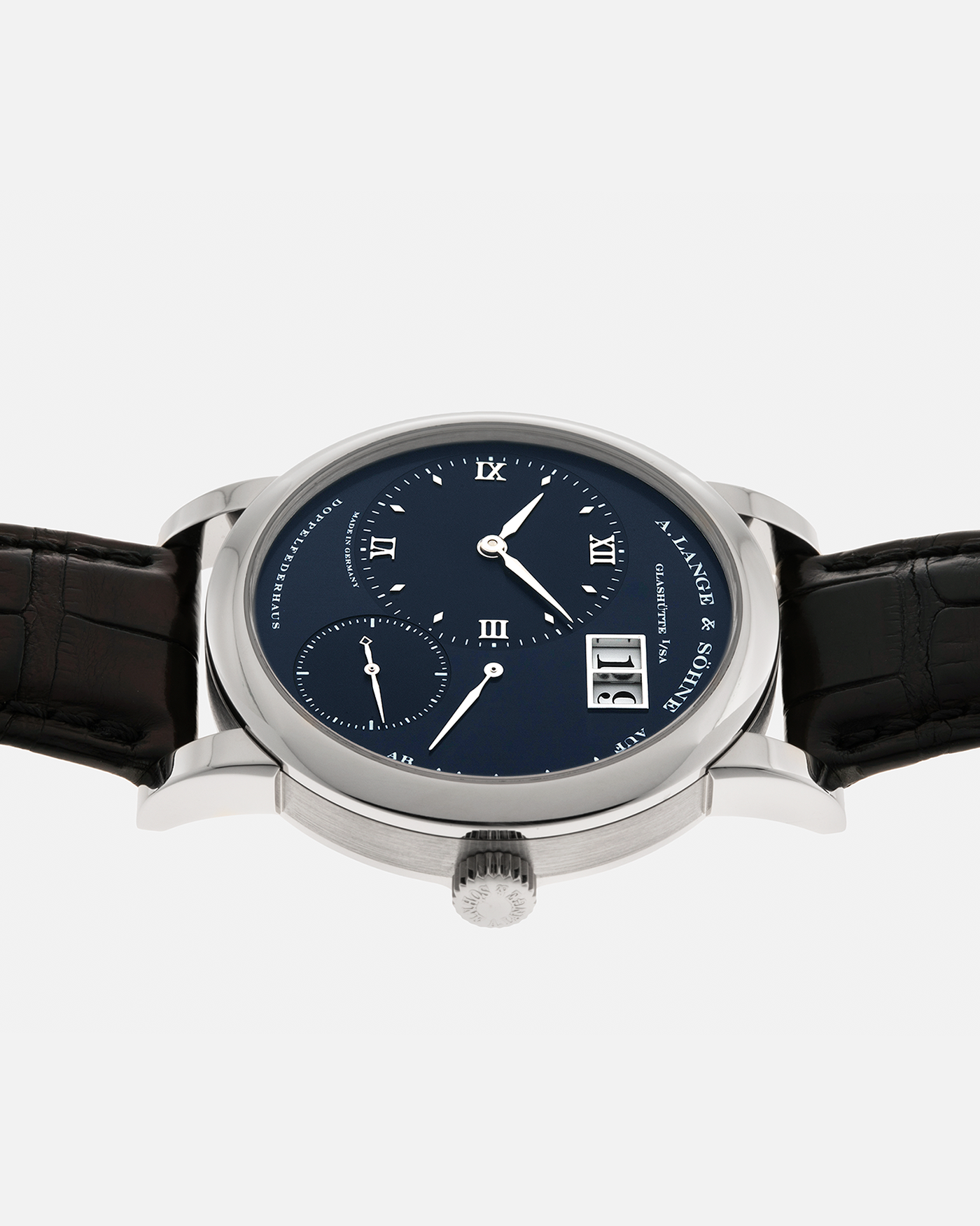 Brand: A. Lange & Söhne
Year: 2000’s
Model: Lange 1
Reference Number: 101.027
Material: 18-carat White Gold
Movement: A. Lange & Söhne Cal. L901.5, Manual Winding
Case Dimensions: 38.5mm x 9.5mm (Lug-to-Lug 47mm)
Lug Width: 20mm
Strap: A. Lange & Söhne Black Alligator Leather Strap with Signed 18-carat White Gold Tang Buckle