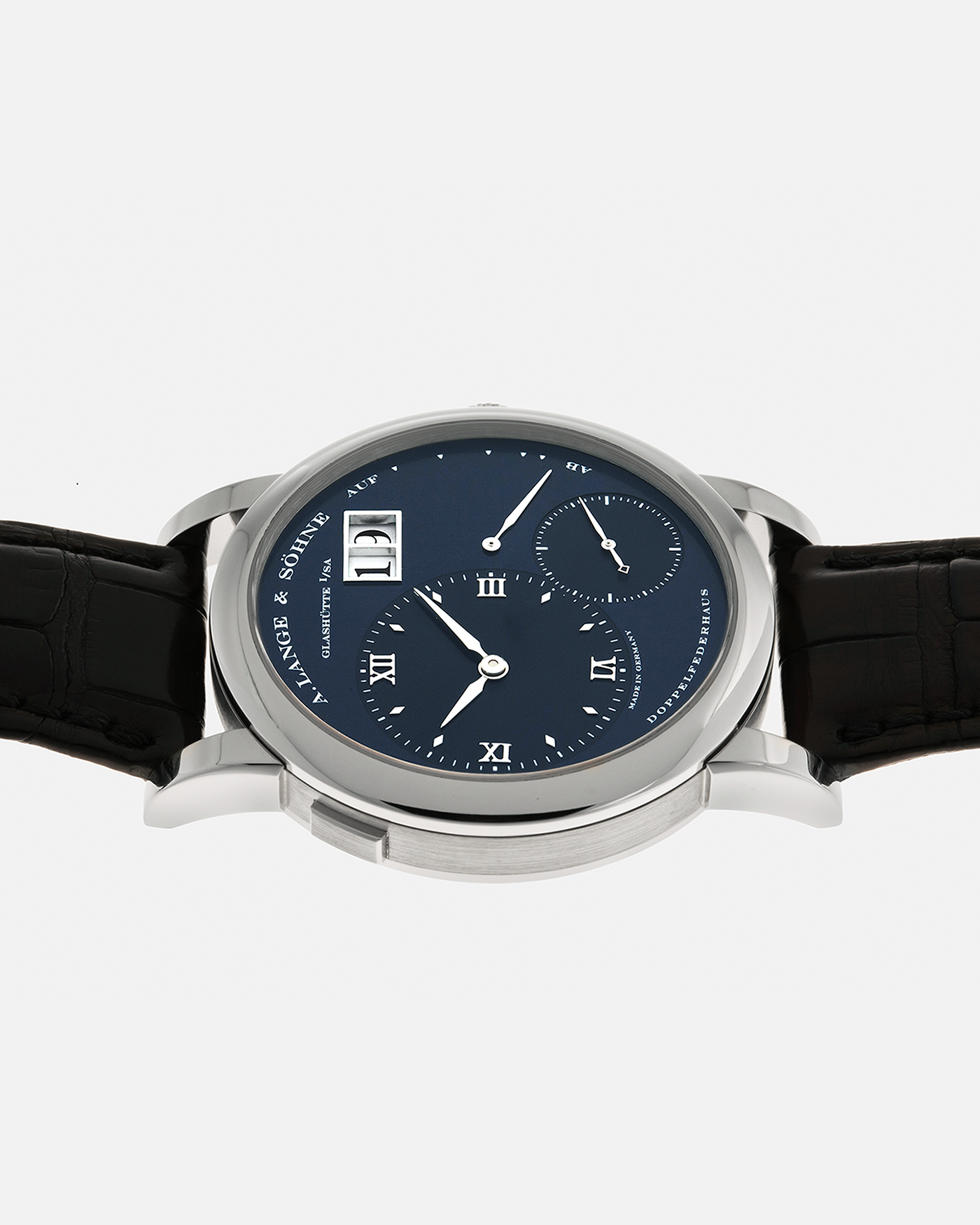 Brand: A. Lange & Söhne
Year: 2000’s
Model: Lange 1
Reference Number: 101.027
Material: 18-carat White Gold
Movement: A. Lange & Söhne Cal. L901.5, Manual Winding
Case Dimensions: 38.5mm x 9.5mm (Lug-to-Lug 47mm)
Lug Width: 20mm
Strap: A. Lange & Söhne Black Alligator Leather Strap with Signed 18-carat White Gold Tang Buckle