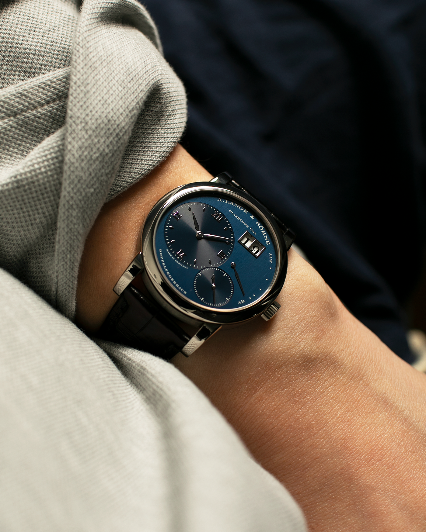 Brand: A. Lange & Söhne
Year: 2000’s
Model: Lange 1
Reference Number: 101.027
Material: 18-carat White Gold
Movement: A. Lange & Söhne Cal. L901.5, Manual Winding
Case Dimensions: 38.5mm x 9.5mm (Lug-to-Lug 47mm)
Lug Width: 20mm
Strap: A. Lange & Söhne Black Alligator Leather Strap with Signed 18-carat White Gold Tang Buckle
