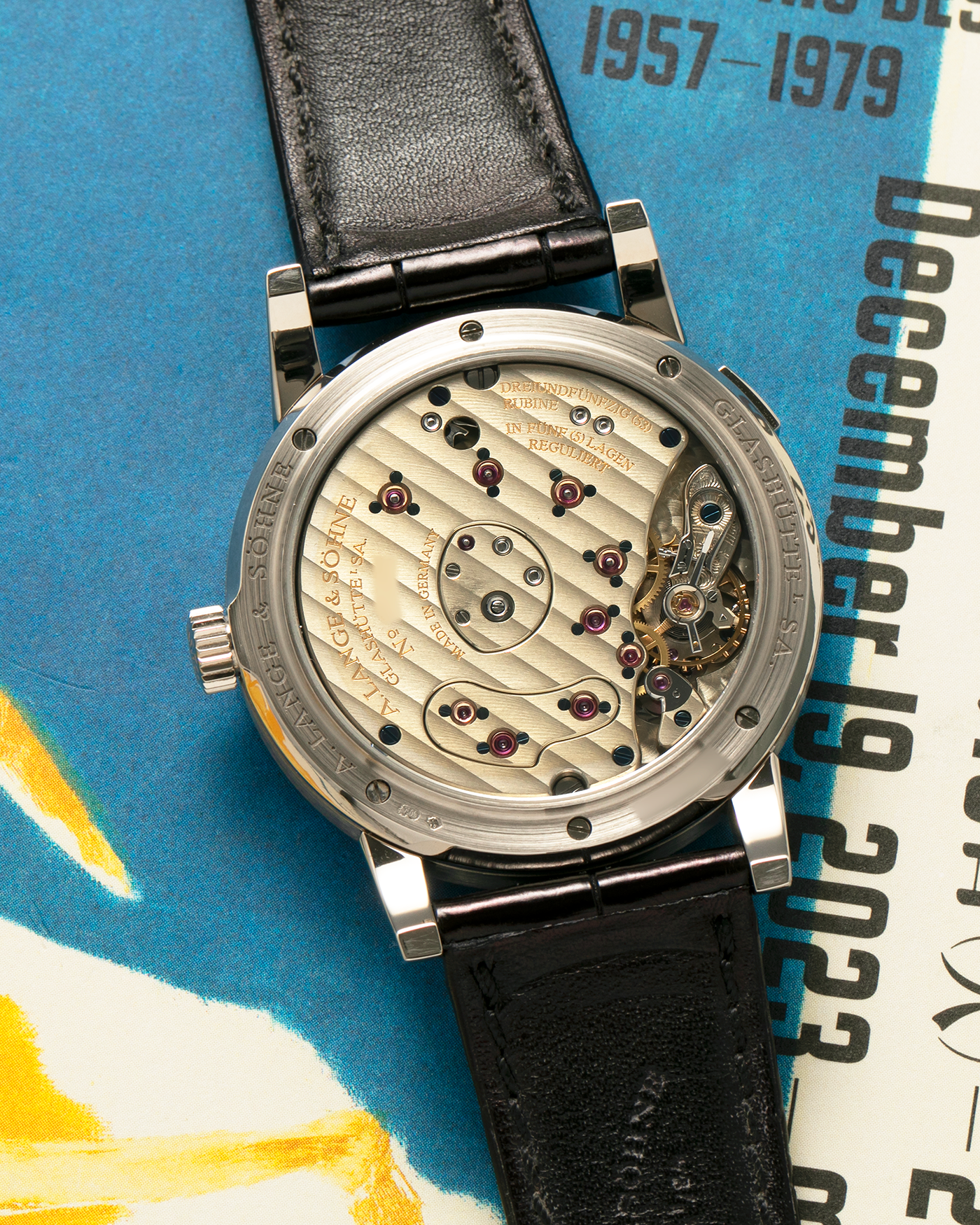 Brand: A. Lange & Söhne
Year: 2000’s
Model: Lange 1
Reference Number: 101.027
Material: 18-carat White Gold
Movement: A. Lange & Söhne Cal. L901.5, Manual Winding
Case Dimensions: 38.5mm x 9.5mm (Lug-to-Lug 47mm)
Lug Width: 20mm
Strap: A. Lange & Söhne Black Alligator Leather Strap with Signed 18-carat White Gold Tang Buckle
