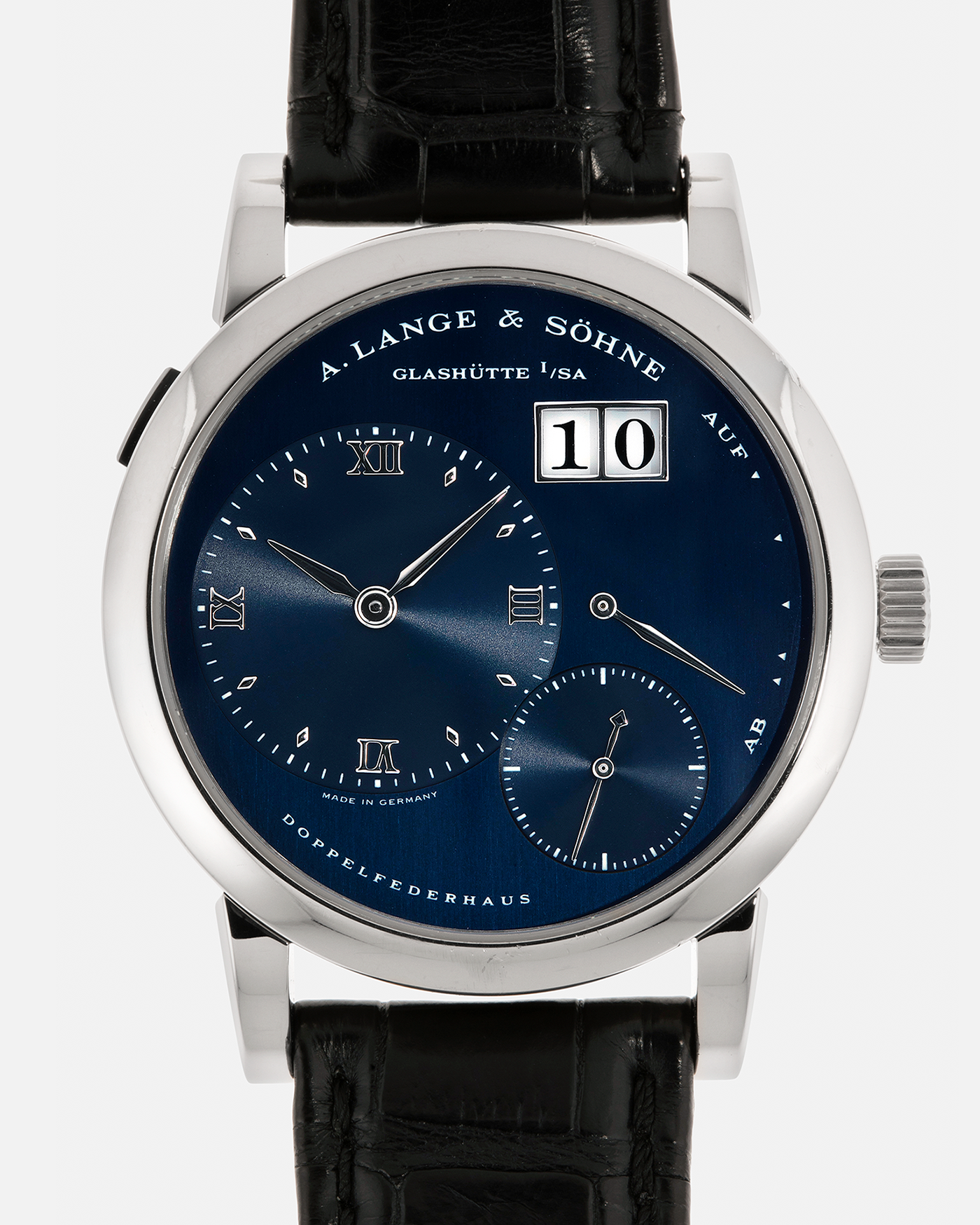Brand: A. Lange & Söhne
Year: 2000’s
Model: Lange 1
Reference Number: 101.027
Material: 18-carat White Gold
Movement: A. Lange & Söhne Cal. L901.0, Manual Winding
Case Dimensions: 38.5mm x 9.5mm (Lug-to-Lug 47mm)
Lug Width: 20mm
Strap: A. Lange & Söhne Black Alligator Leather Strap with Signed 18-carat White Gold Tang Buckle