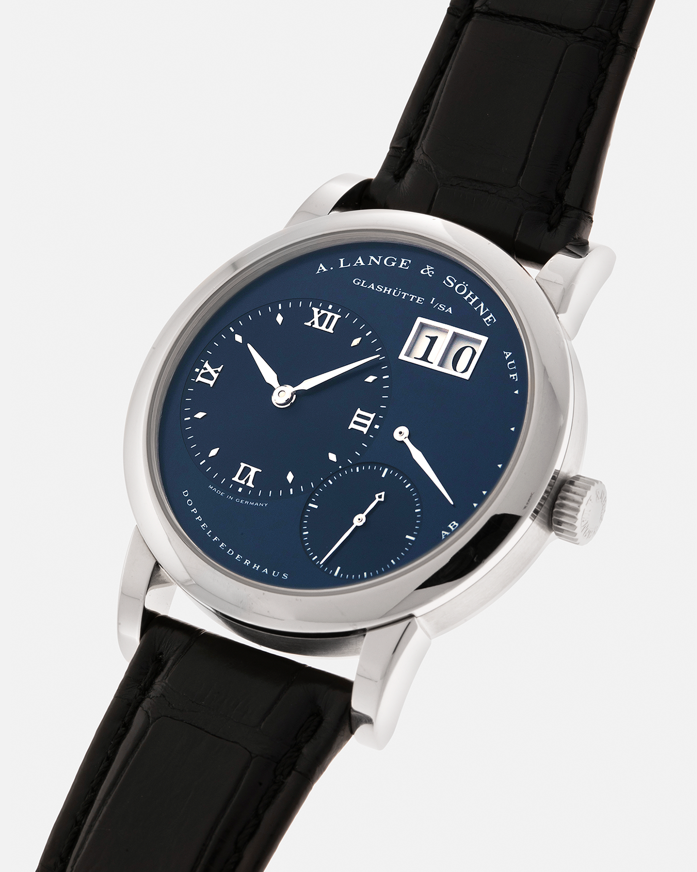 Brand: A. Lange & Söhne
Year: 2000’s
Model: Lange 1
Reference Number: 101.027
Material: 18-carat White Gold
Movement: A. Lange & Söhne Cal. L901.0, Manual Winding
Case Dimensions: 38.5mm x 9.5mm (Lug-to-Lug 47mm)
Lug Width: 20mm
Strap: A. Lange & Söhne Black Alligator Leather Strap with Signed 18-carat White Gold Tang Buckle