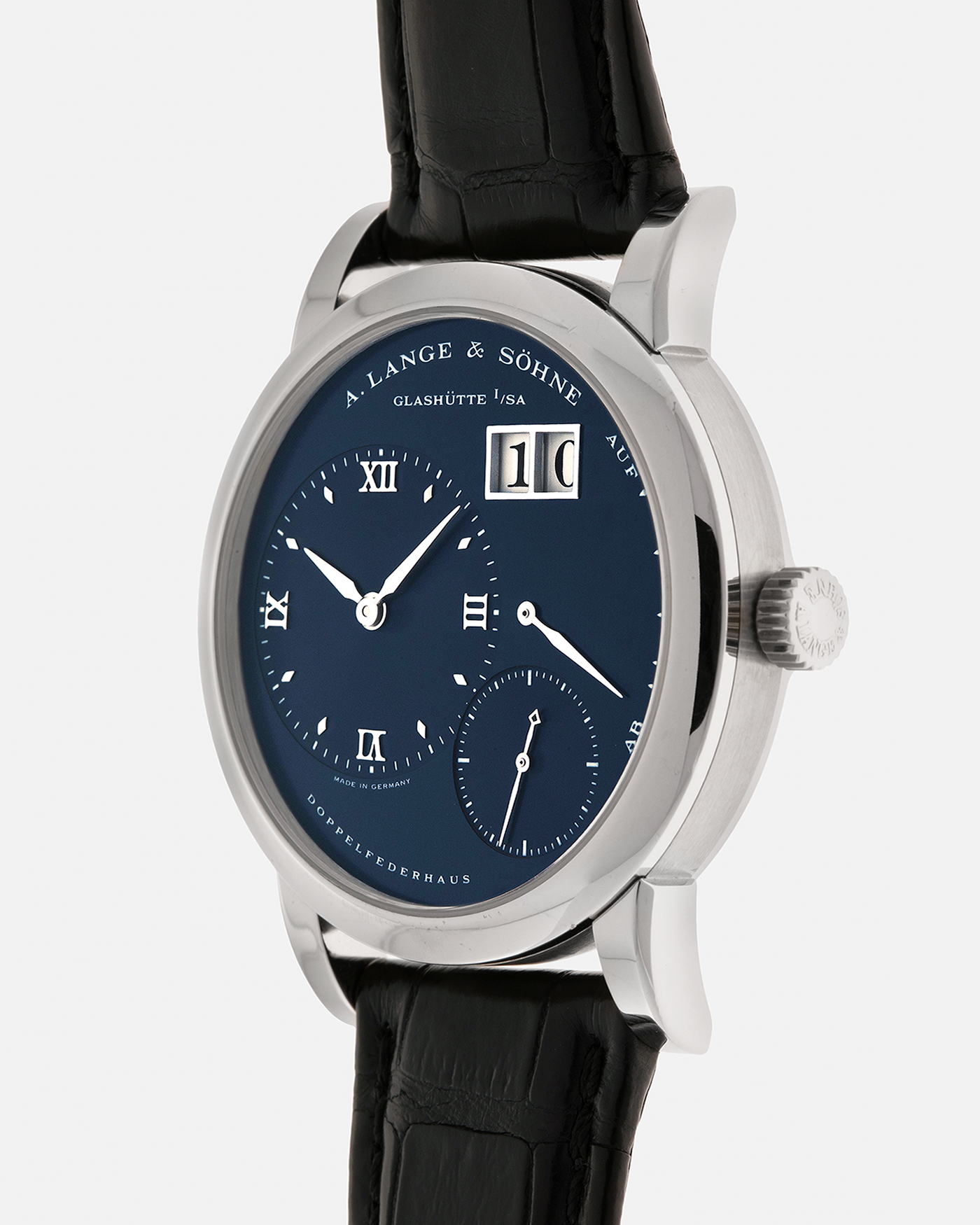 Brand: A. Lange & Söhne
Year: 2000’s
Model: Lange 1
Reference Number: 101.027
Material: 18-carat White Gold
Movement: A. Lange & Söhne Cal. L901.0, Manual Winding
Case Dimensions: 38.5mm x 9.5mm (Lug-to-Lug 47mm)
Lug Width: 20mm
Strap: A. Lange & Söhne Black Alligator Leather Strap with Signed 18-carat White Gold Tang Buckle