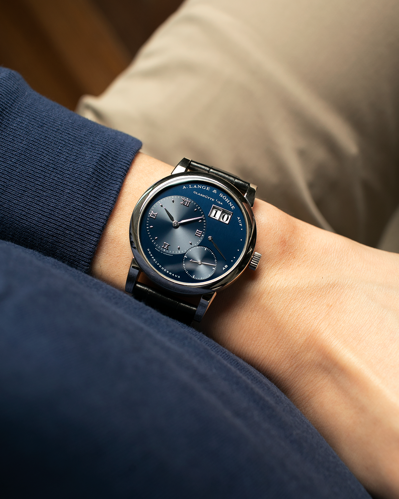 Brand: A. Lange & Söhne
Year: 2000’s
Model: Lange 1
Reference Number: 101.027
Material: 18-carat White Gold
Movement: A. Lange & Söhne Cal. L901.0, Manual Winding
Case Dimensions: 38.5mm x 9.5mm (Lug-to-Lug 47mm)
Lug Width: 20mm
Strap: A. Lange & Söhne Black Alligator Leather Strap with Signed 18-carat White Gold Tang Buckle
