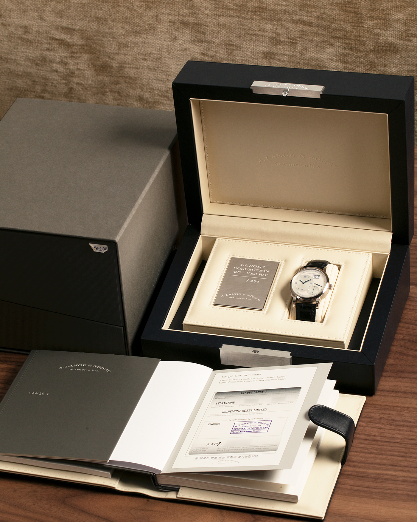 Brand: A. Lange & Söhne
Year: 2019
Model: Lange 1 Edition 25th Anniversary
Reference Number: 191.066
Material: 18-carat White Gold
Movement: A. Lange & Söhne Cal. L121.1, Manual-Winding
Case Dimensions: 38.5mm x 10.7mm (Lug-to-Lug 47.5mm)
Lug Width: 20mm
Strap: A. Lange & Söhne Black Alligator Leather Strap with Signed 18-carat White Gold Tang Buckle