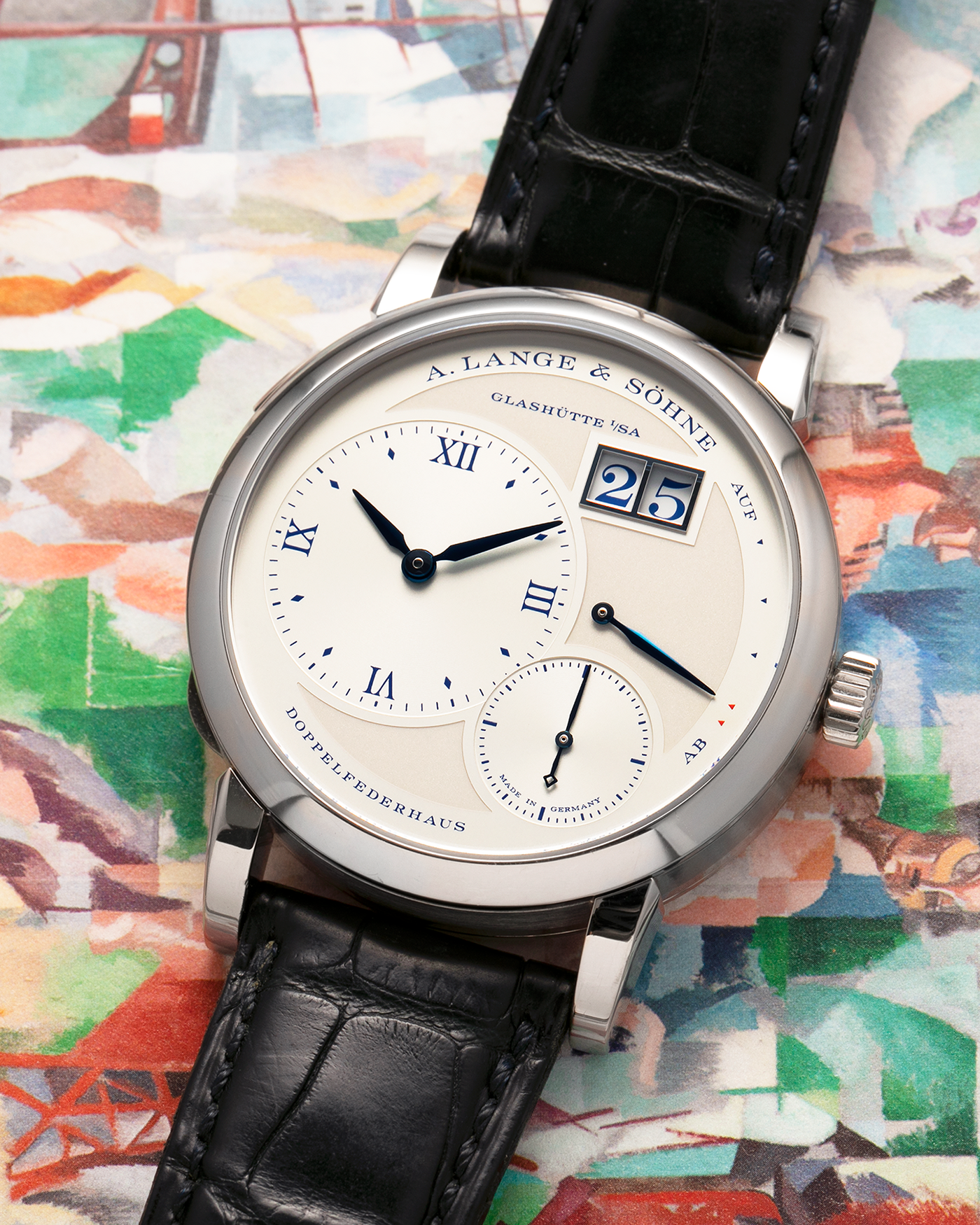 Brand: A. Lange & Söhne
Year: 2019
Model: Lange 1 Edition 25th Anniversary
Reference Number: 191.066
Material: 18-carat White Gold
Movement: A. Lange & Söhne Cal. L121.1, Manual-Winding
Case Dimensions: 38.5mm x 10.7mm (Lug-to-Lug 47.5mm)
Lug Width: 20mm
Strap: A. Lange & Söhne Black Alligator Leather Strap with Signed 18-carat White Gold Tang Buckle