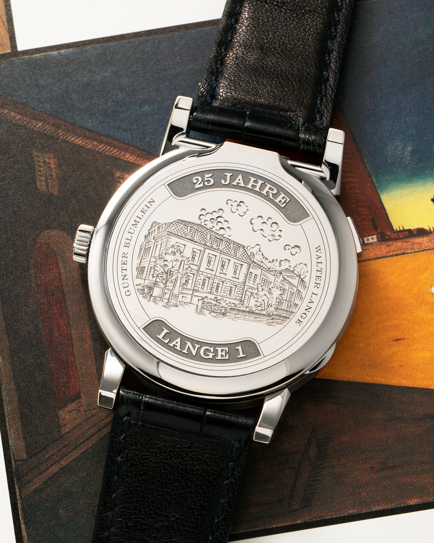 Brand: A. Lange & Söhne
Year: 2019
Model: Lange 1 Edition 25th Anniversary
Reference Number: 191.066
Material: 18-carat White Gold
Movement: A. Lange & Söhne Cal. L121.1, Manual-Winding
Case Dimensions: 38.5mm x 10.7mm (Lug-to-Lug 47.5mm)
Lug Width: 20mm
Strap: A. Lange & Söhne Black Alligator Leather Strap with Signed 18-carat White Gold Tang Buckle