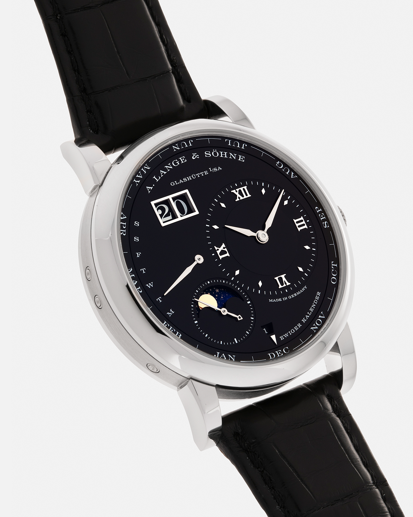 Brand: A. Lange & Söhne
Year: 2023
Model: Lange 1 Perpetual Calendar ‘Darth’
Reference Number: 345.036 E
Material: Platinum 950
Movement: A. Lange & Söhne Cal. L021.3, Self-Winding
Case Dimensions: 41.9mm x 12.1mm (Lug-to-Lug 50mm)
Lug Width: 22mm
Strap: A. Lange & Söhne Black Alligator Leather Strap with Signed Platinum 950 Tang Buckle