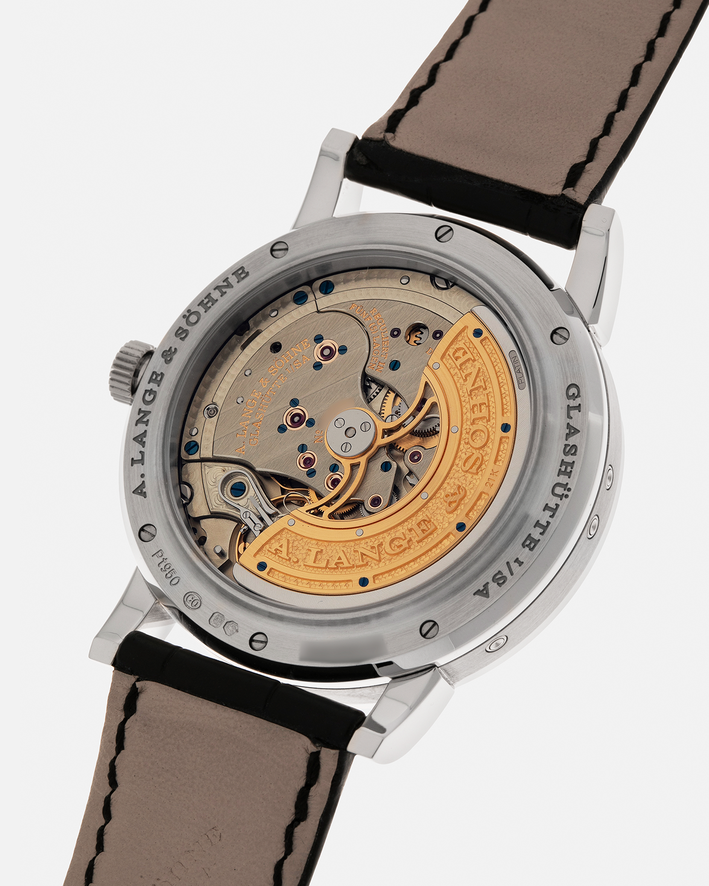 Brand: A. Lange & Söhne
Year: 2023
Model: Lange 1 Perpetual Calendar ‘Darth’
Reference Number: 345.036 E
Material: Platinum 950
Movement: A. Lange & Söhne Cal. L021.3, Self-Winding
Case Dimensions: 41.9mm x 12.1mm (Lug-to-Lug 50mm)
Lug Width: 22mm
Strap: A. Lange & Söhne Black Alligator Leather Strap with Signed Platinum 950 Tang Buckle